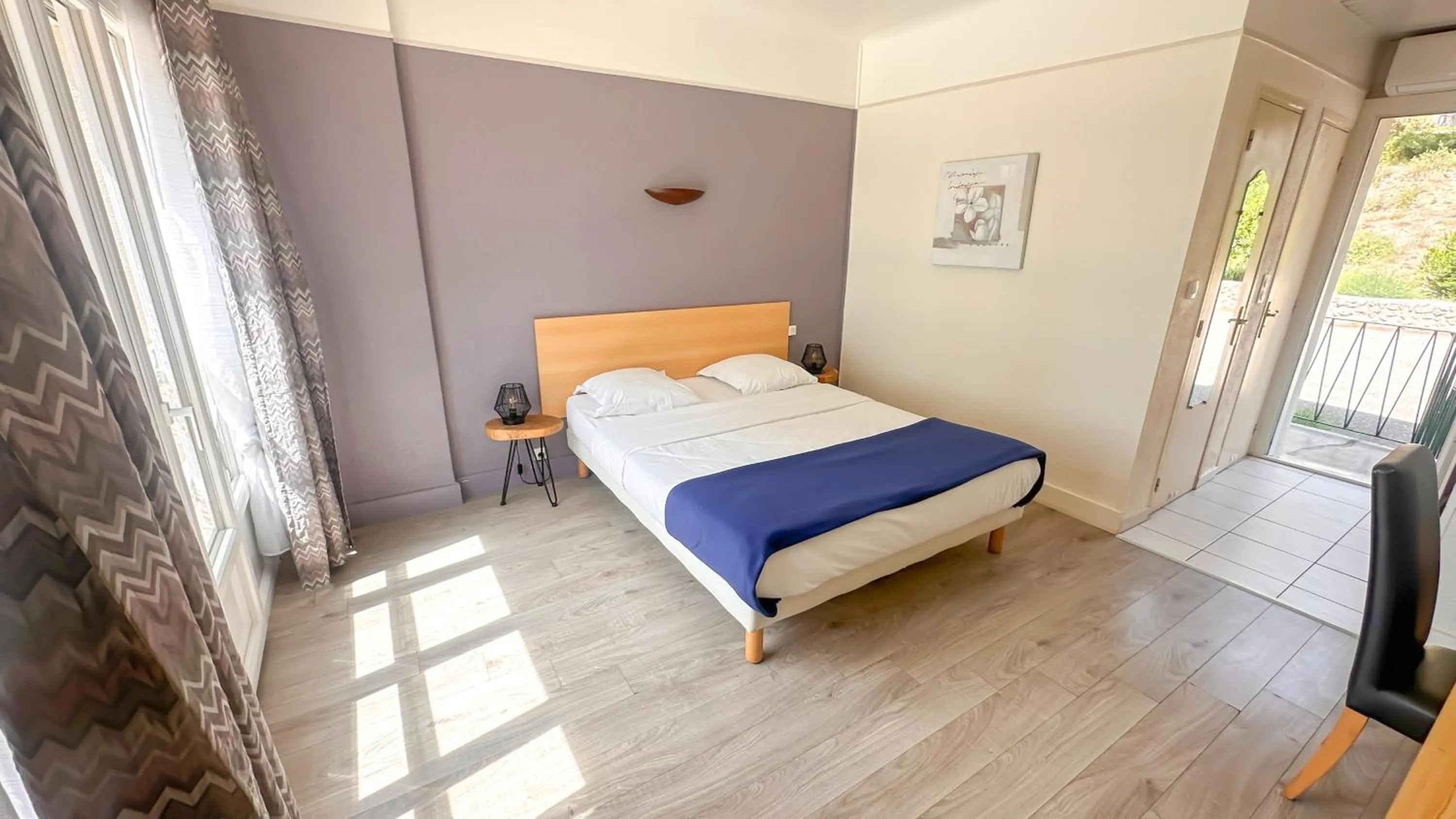 Bed in Hotel Les Rocailles