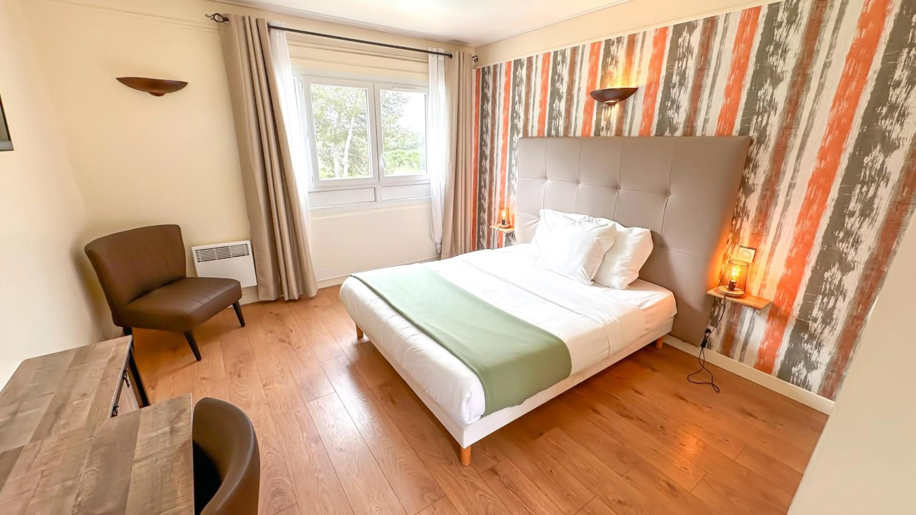 Bed in Hotel Les Rocailles