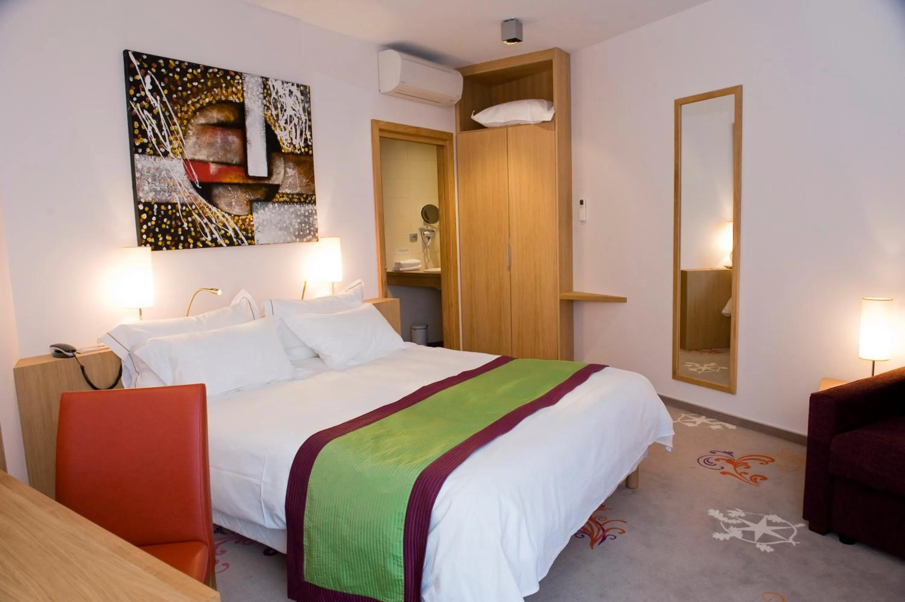 Photo of the whole room, Bed in Logis Hotel Restaurant A L'Etoile