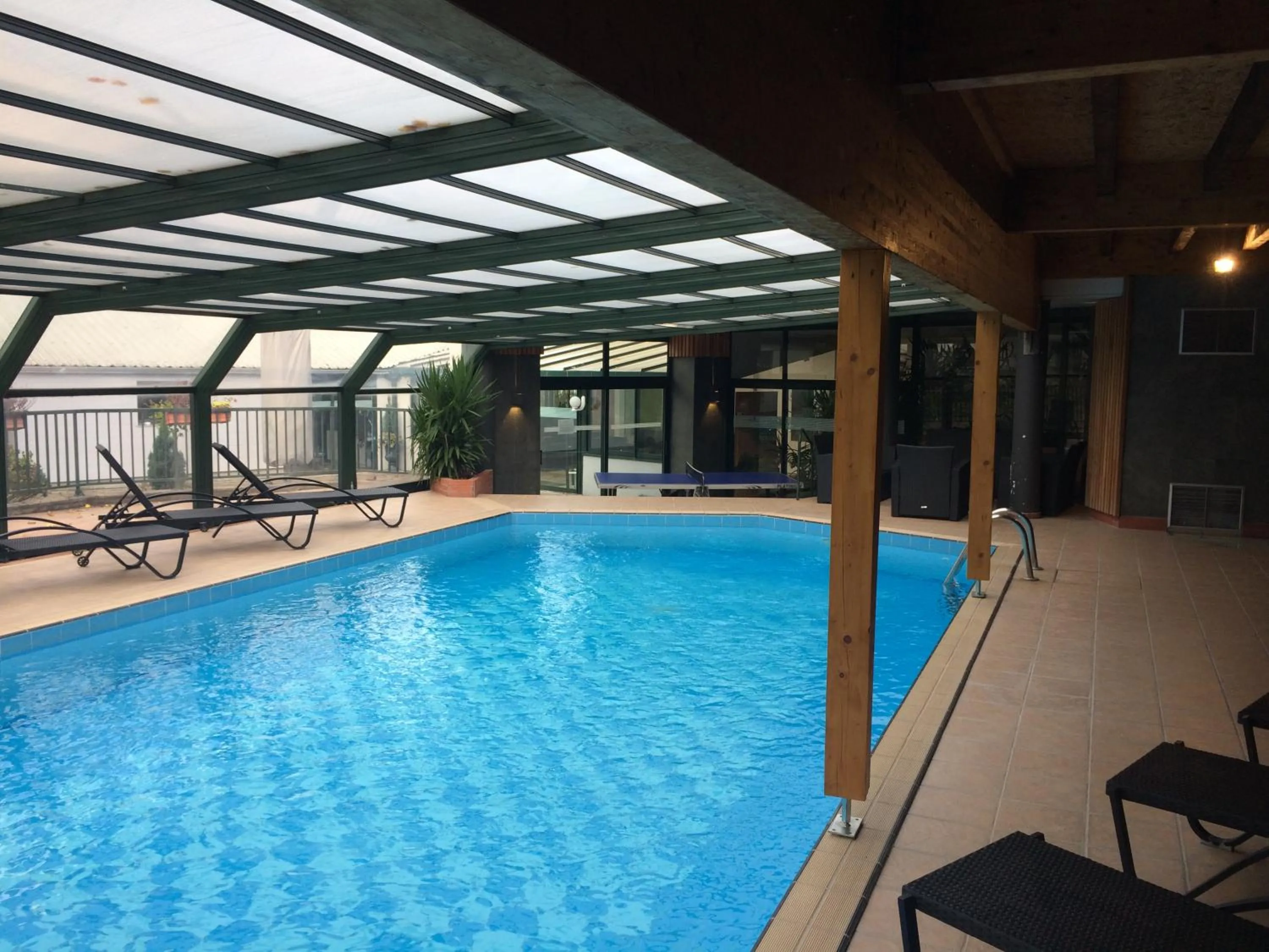 Swimming pool in Logis La Résidence