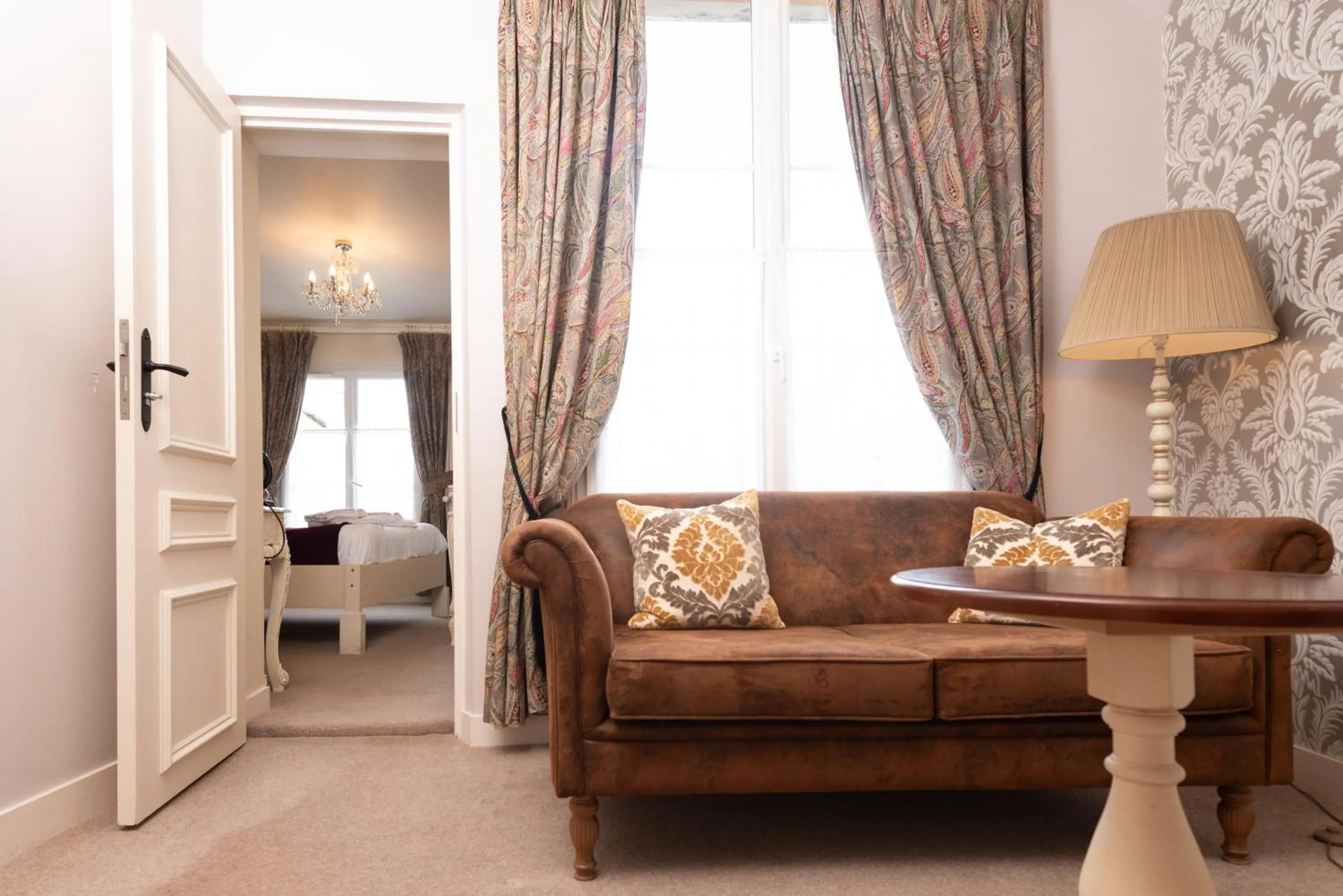 Seating area in Logis Hotel De France