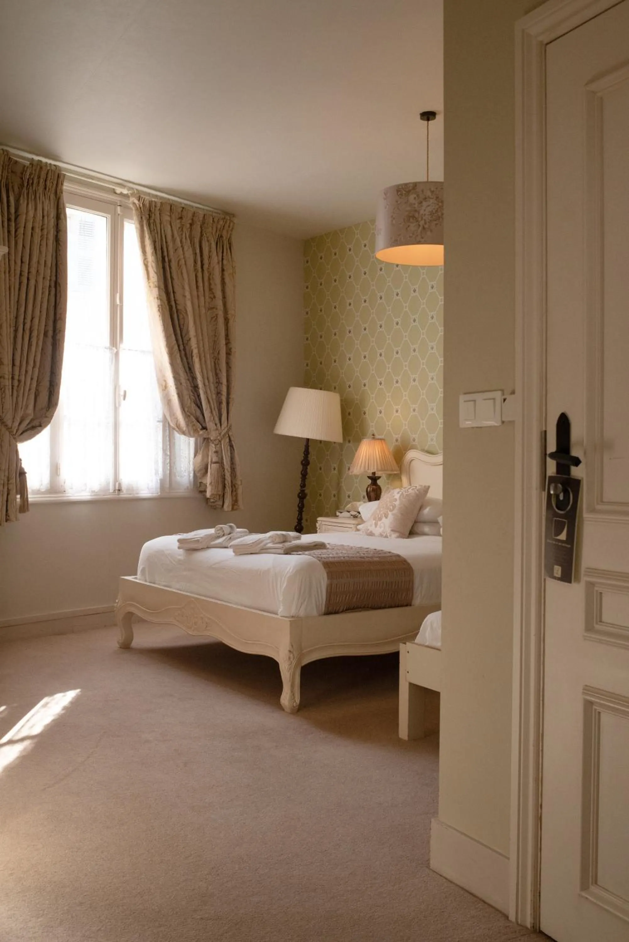 Bed in Logis Hotel De France