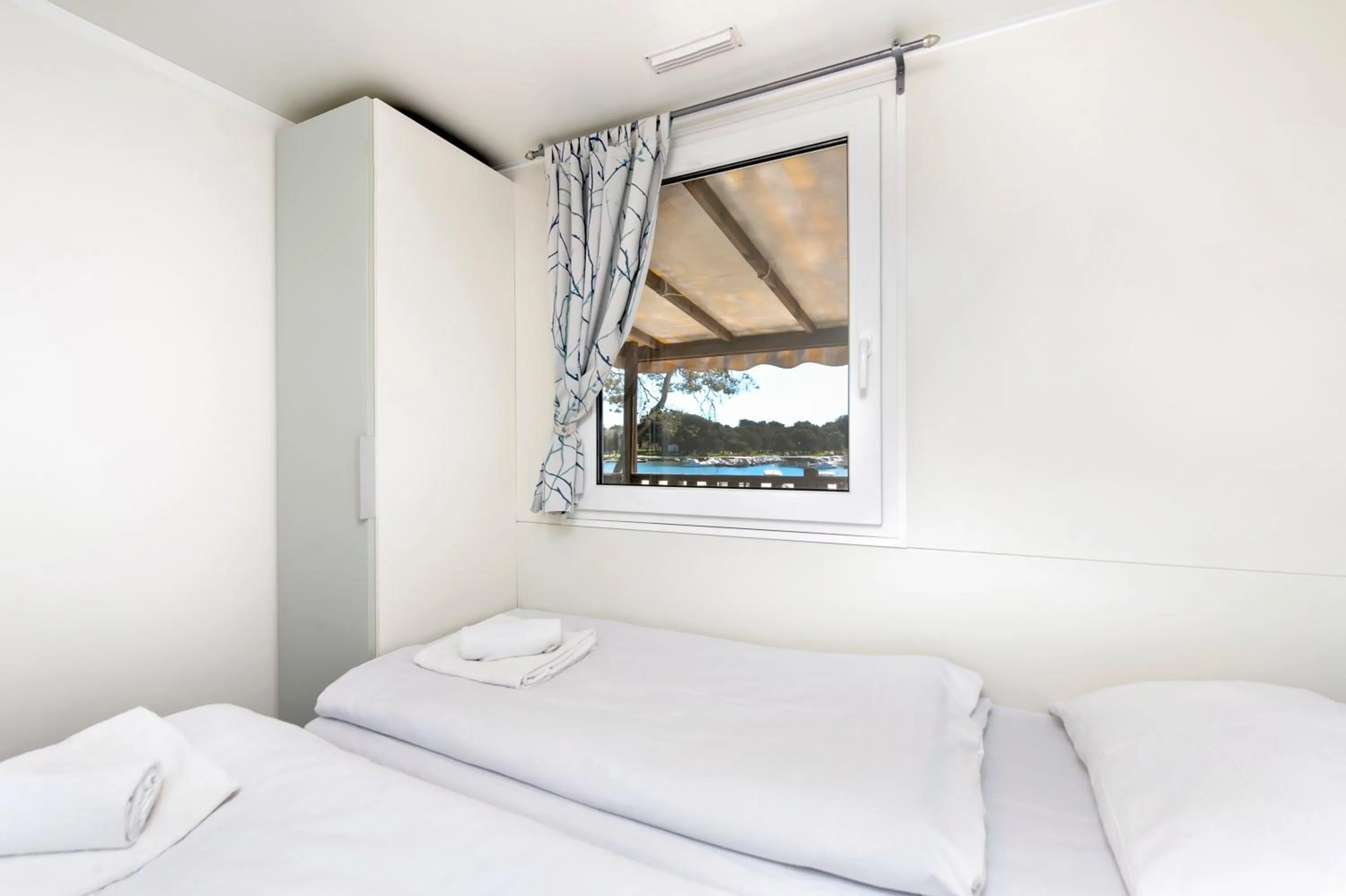 Bedroom, Bed in Glamping and Mobile Homes Lavanda - Holiday Centre Bi VIllage