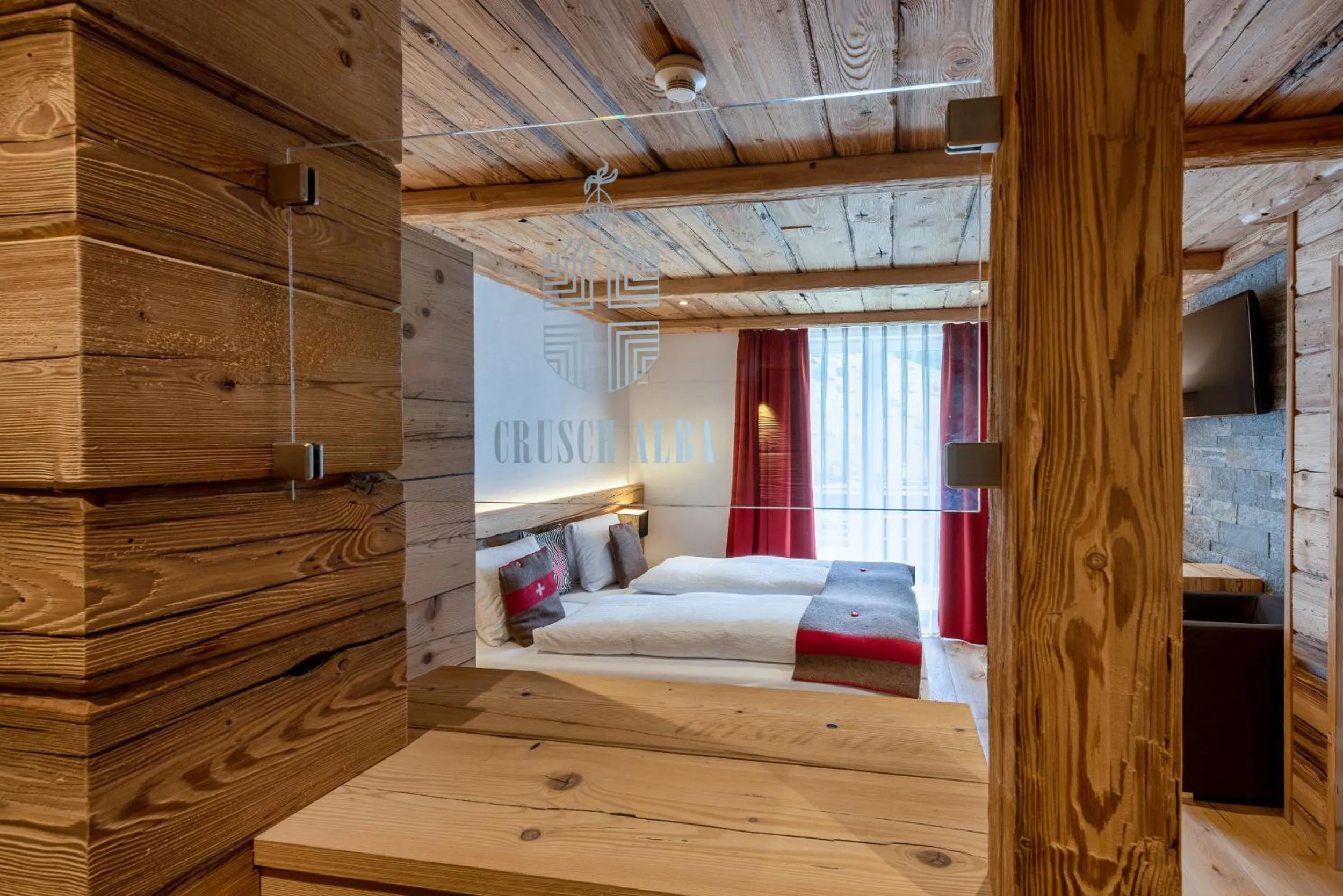 Photo of the whole room, Bed in Hotel Crusch Alba Zernez