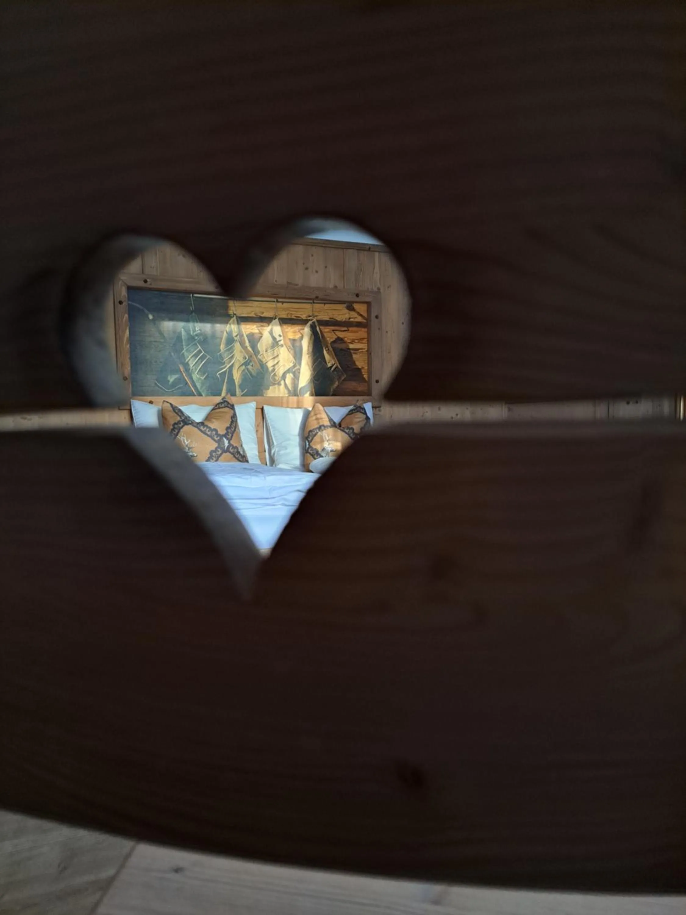 Bed in Stauders Zimmer und Ferienwohnungen