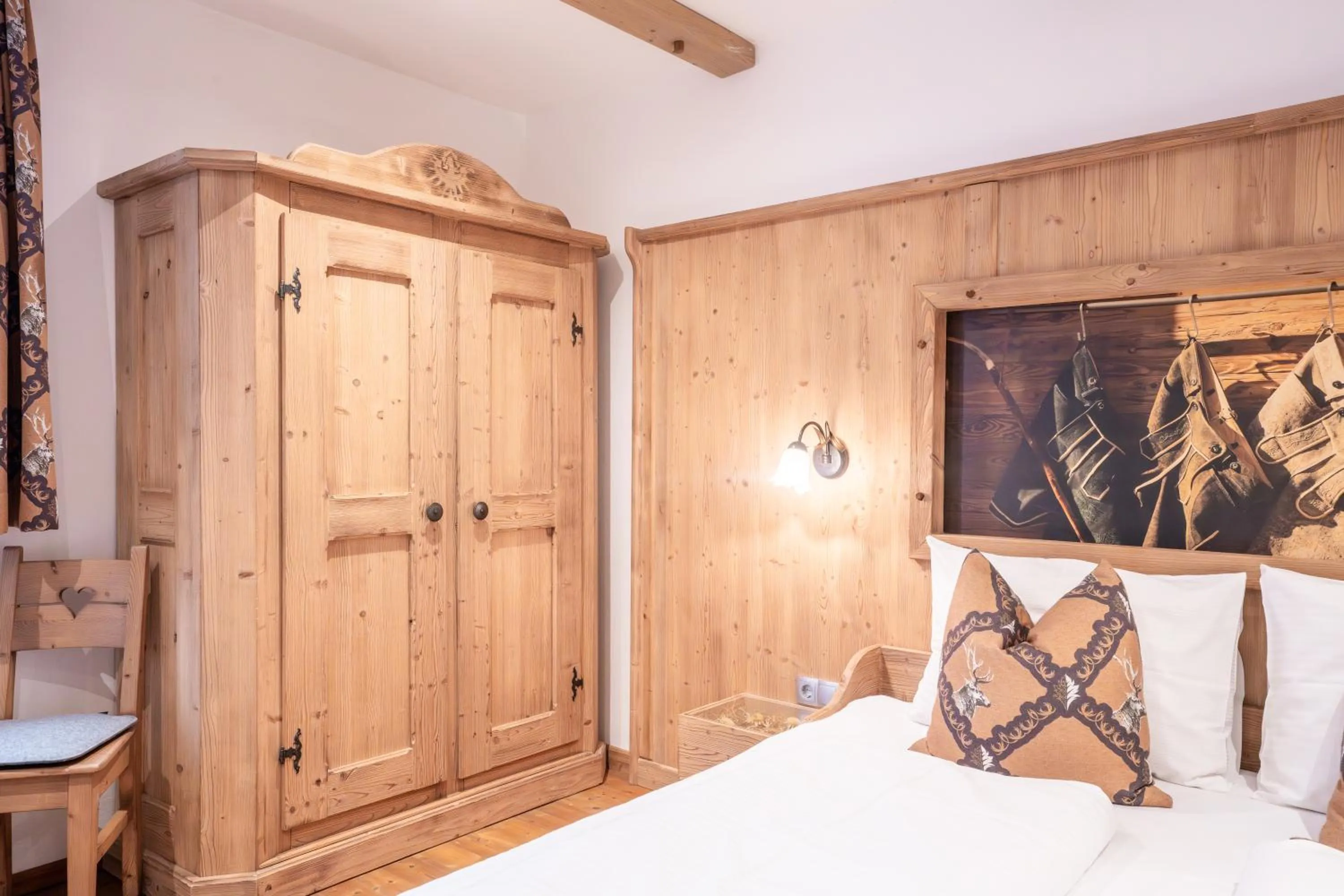 Bed in Stauders Zimmer und Ferienwohnungen