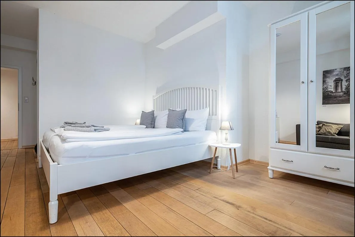 Bed in MARKT EINS Gästezimmer