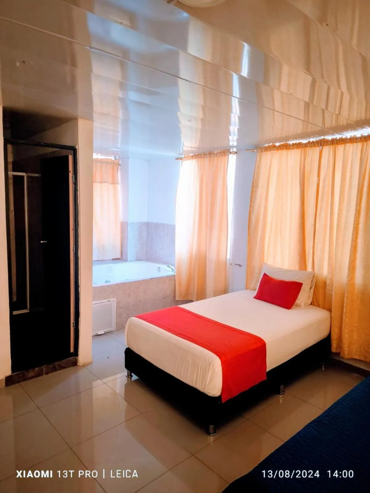 Bed in Hotel Cafe Plaza