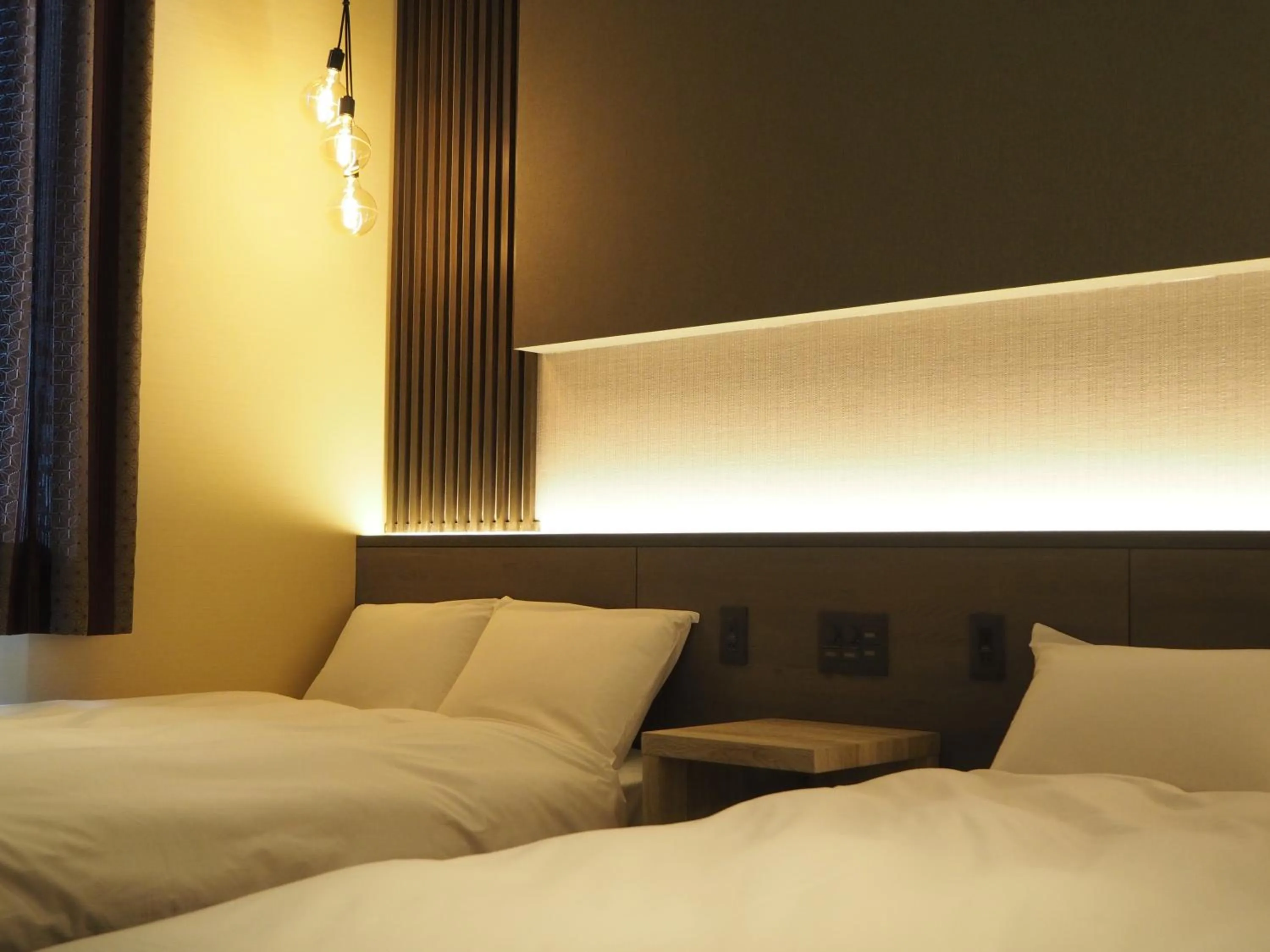 Bed in Kojohama Onsen Hotel