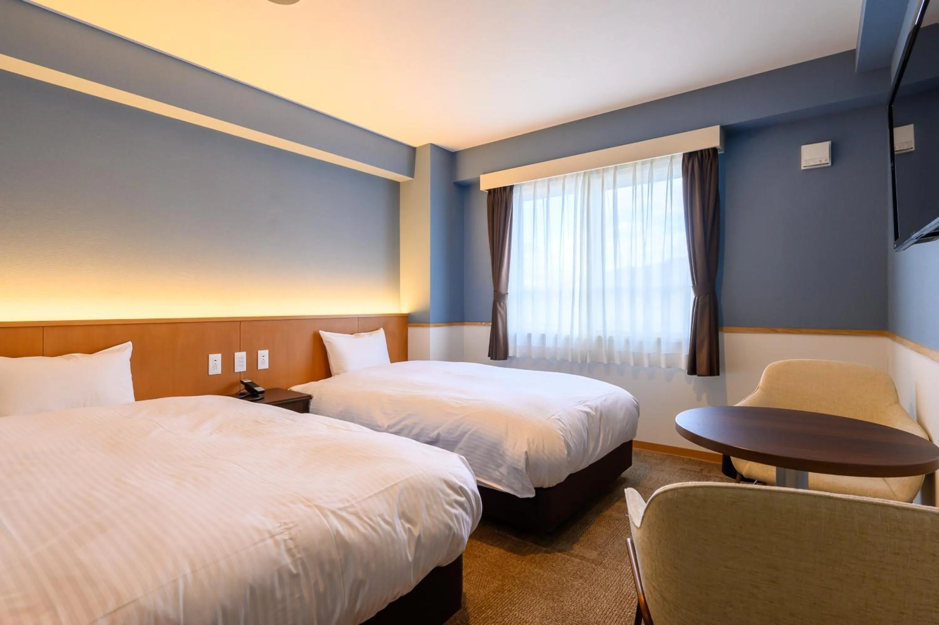 Bed in Kojohama Onsen Hotel