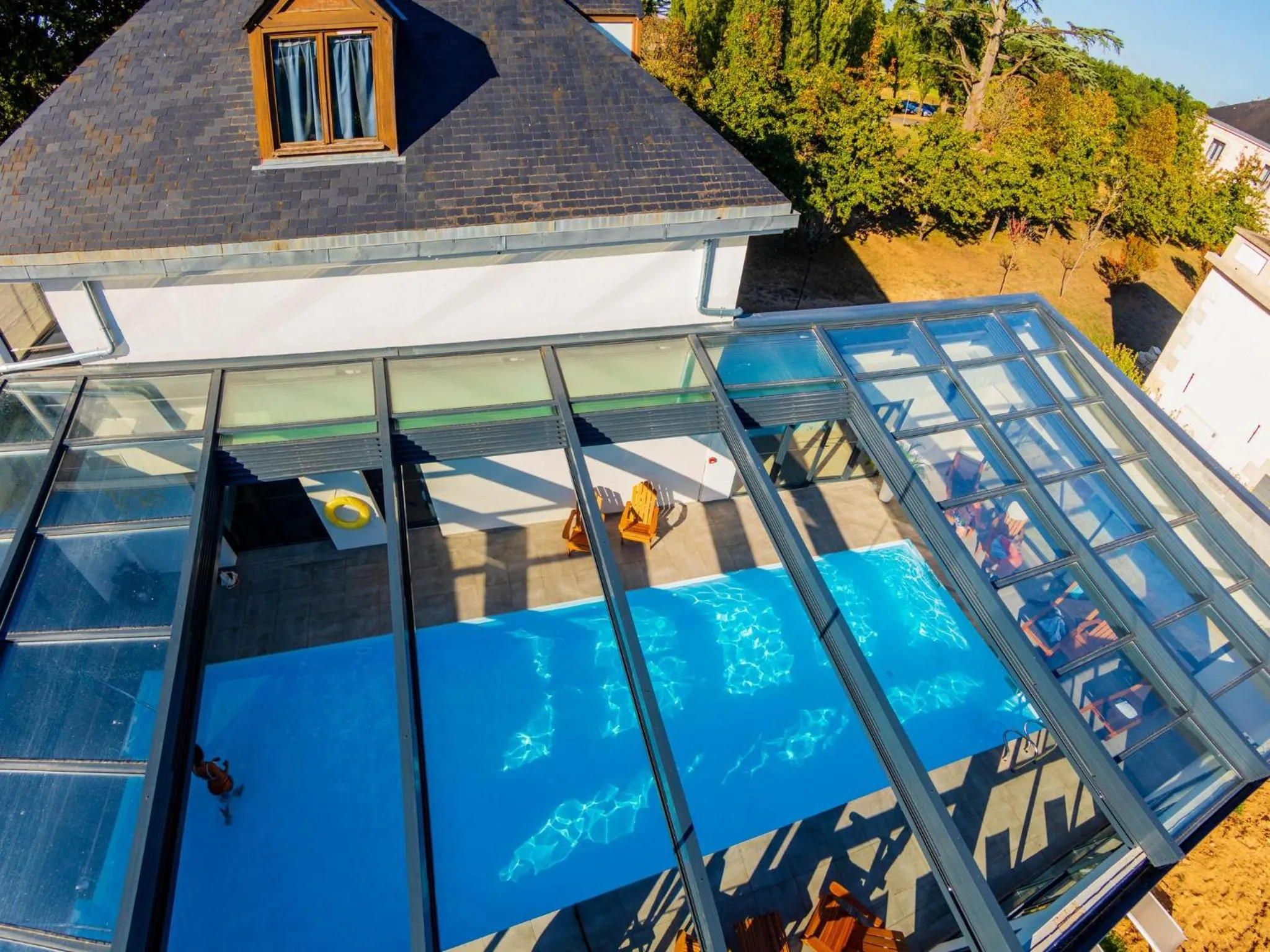 Swimming pool in Garrigae Manoir de Beauvoir Poitiers Sud - Hotel & Spa