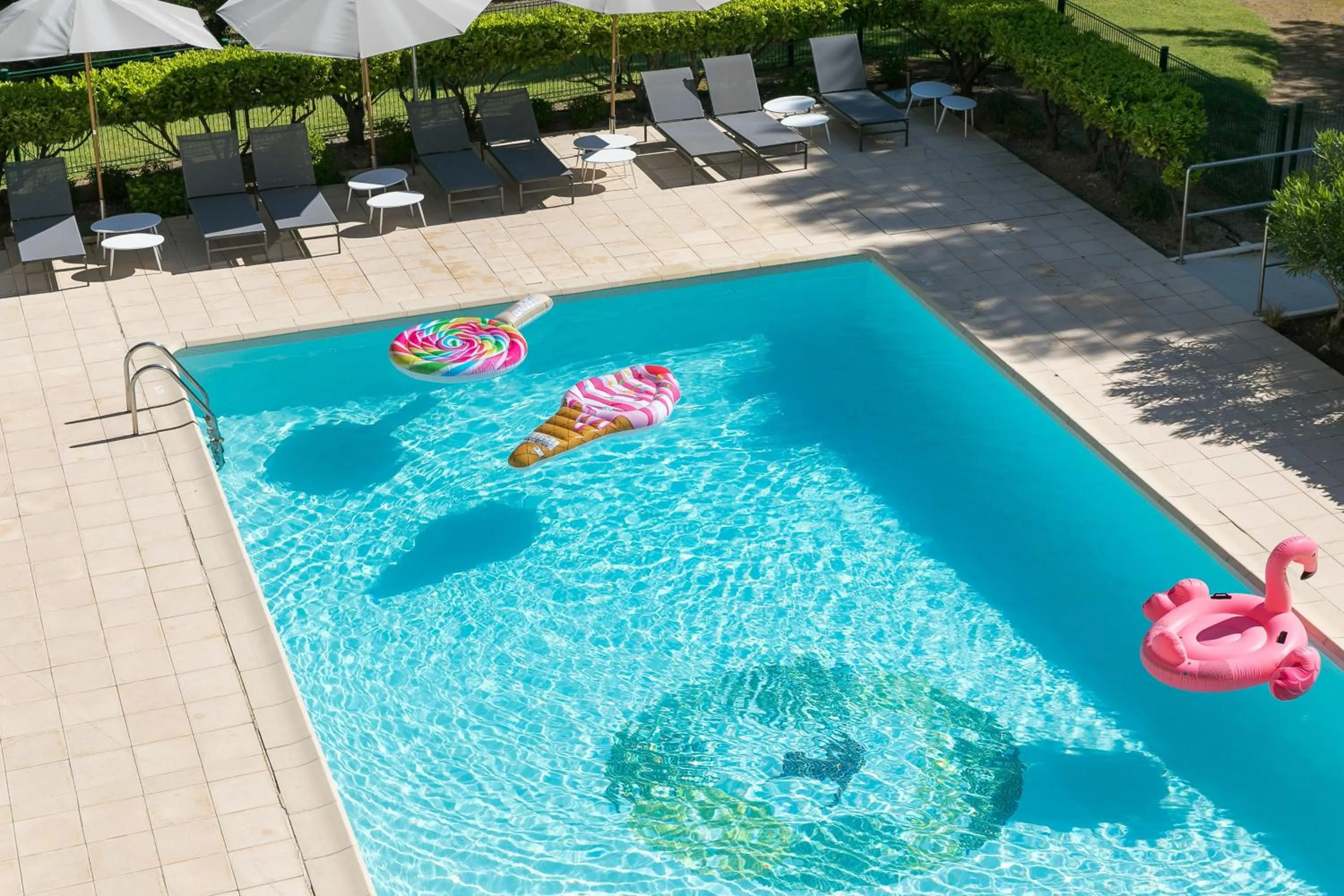 Swimming pool in Hôtel Birdy by Happyculture