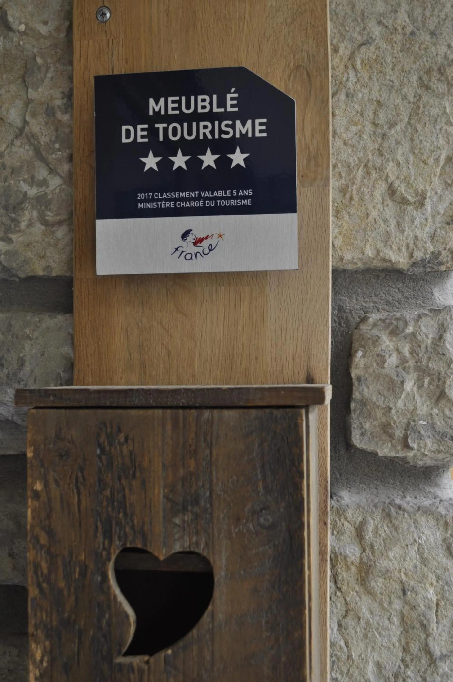 Property logo or sign in Chalet la Cachette Cyclists & Skiers
