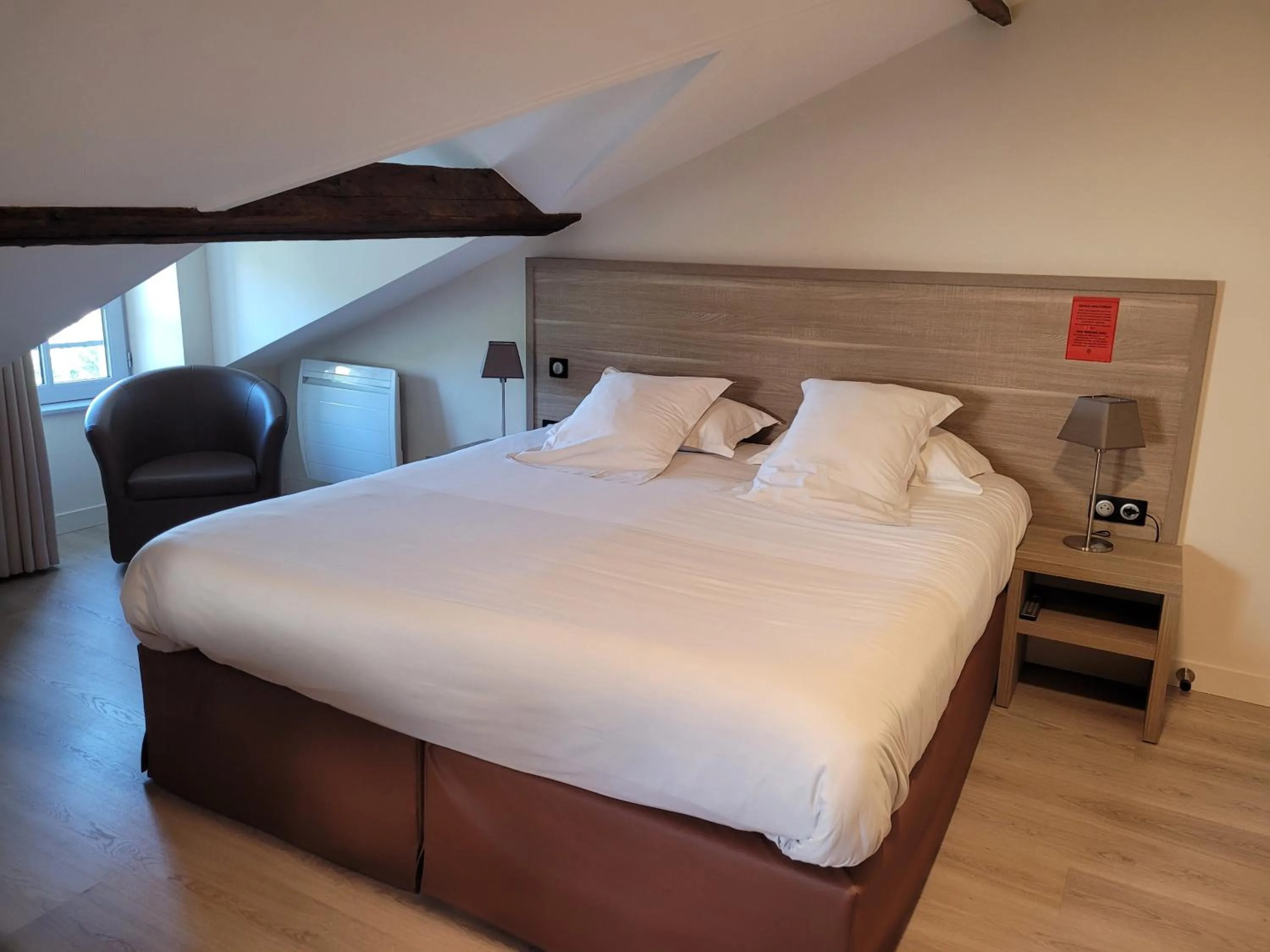 Bed in L'Hotellerie de la Toile à Beurre