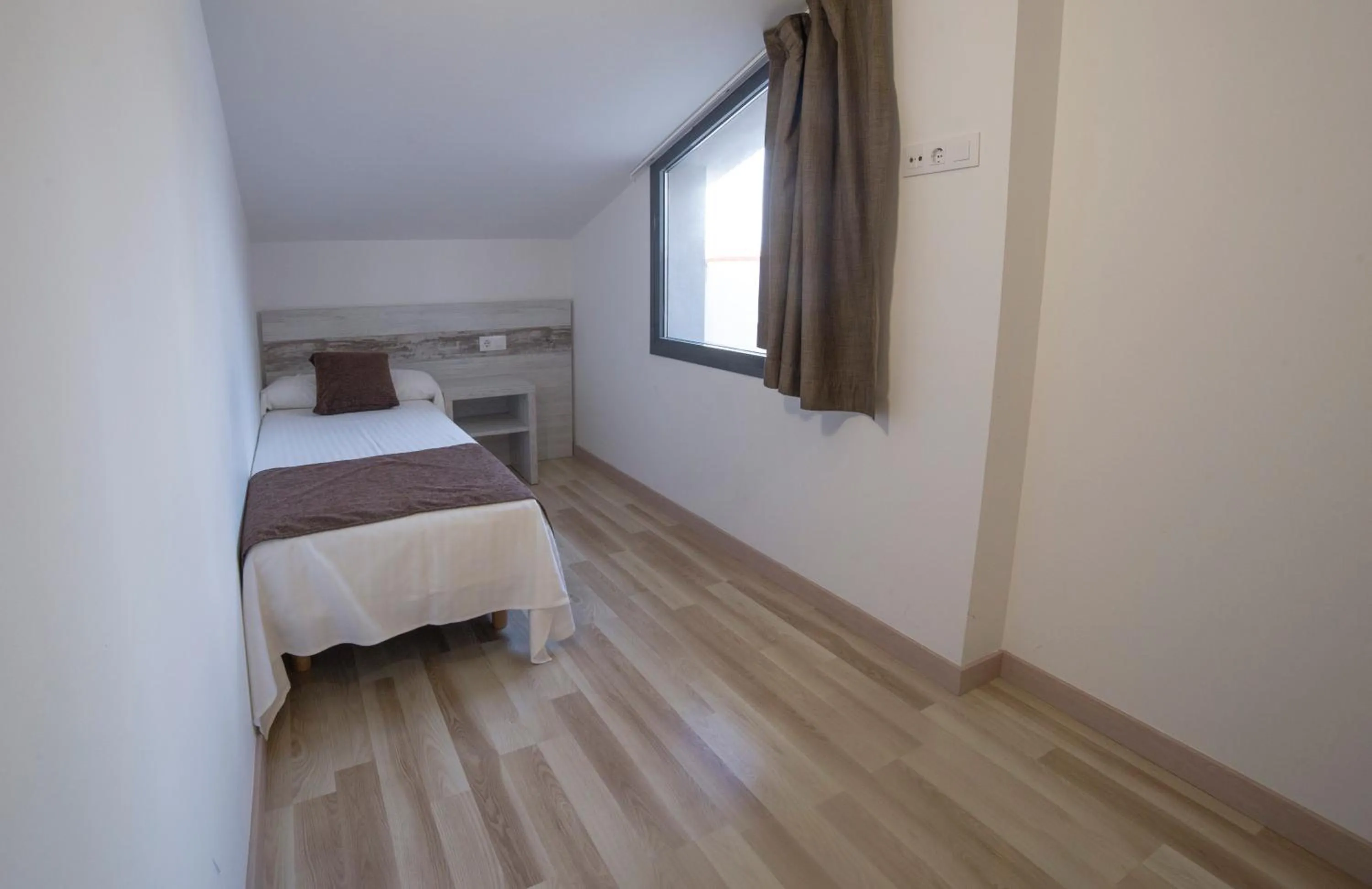 Bed in Apartaments Ponent