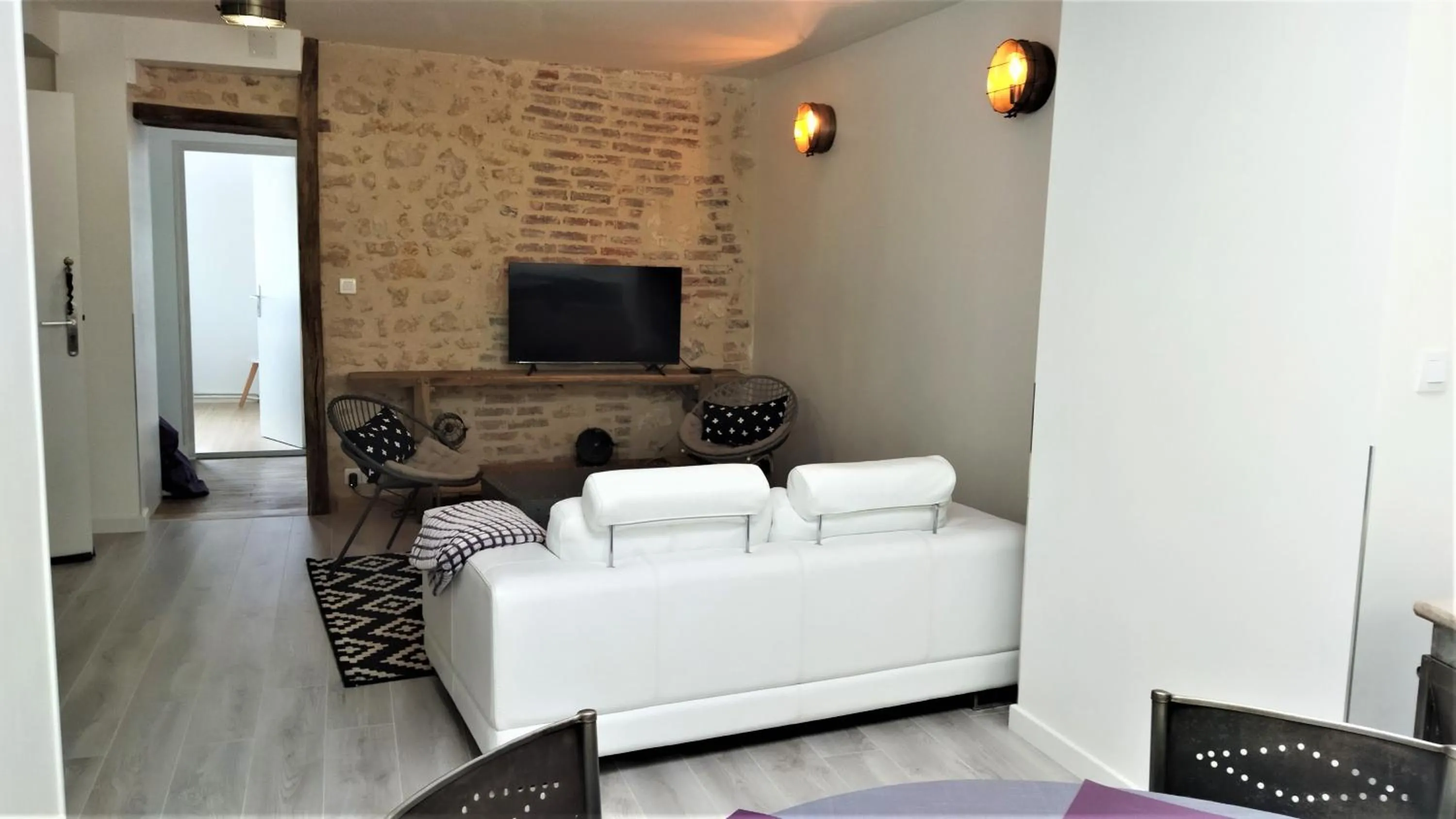 Living room in Appartements Les remparts d'Alienor