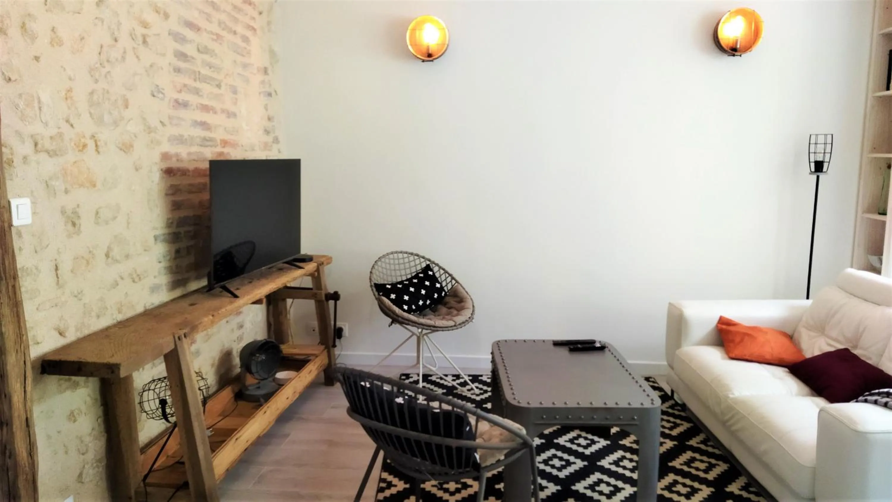 Living room in Appartements Les remparts d'Alienor