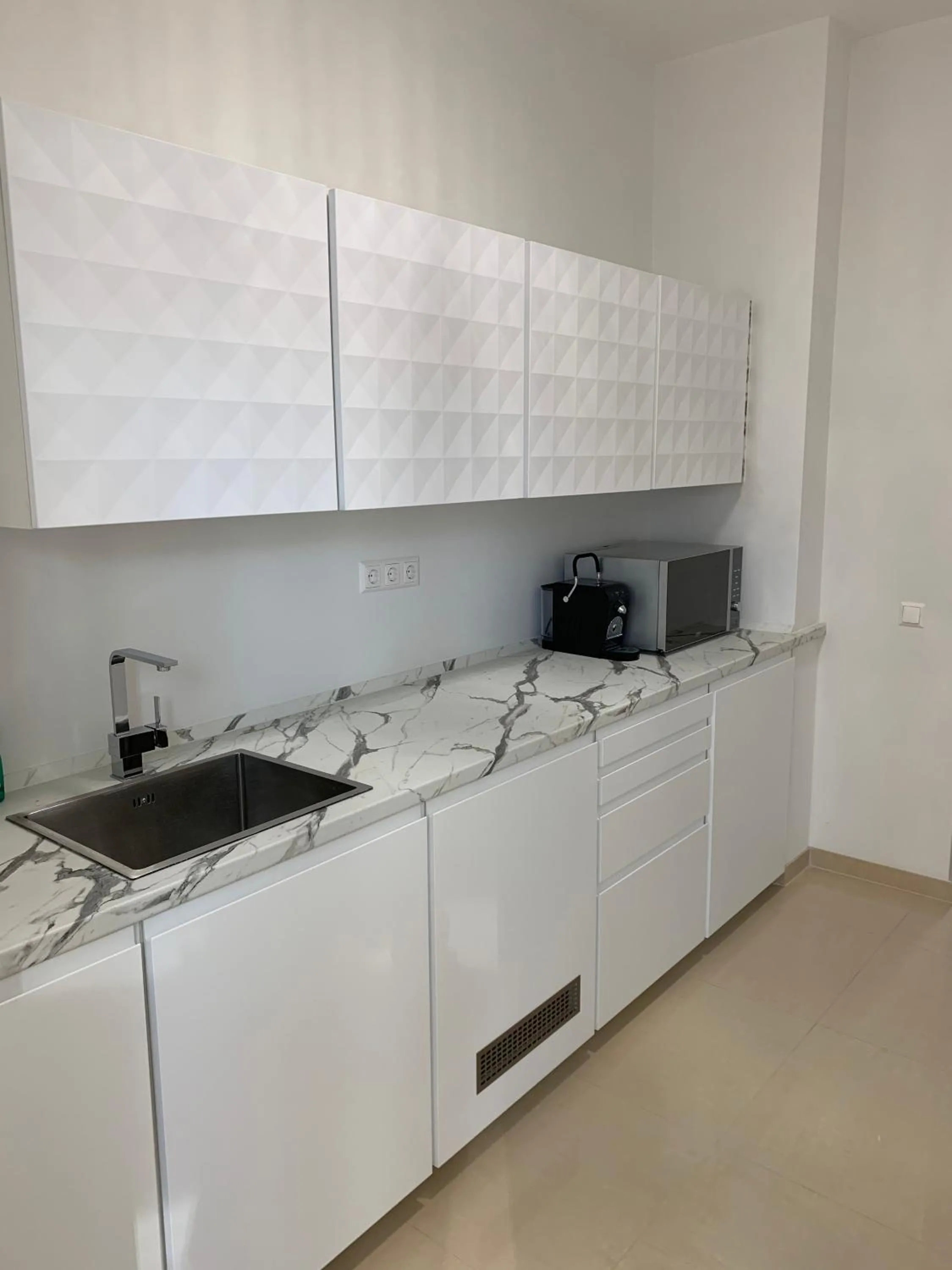 Kitchen or kitchenette in Colony Apartments