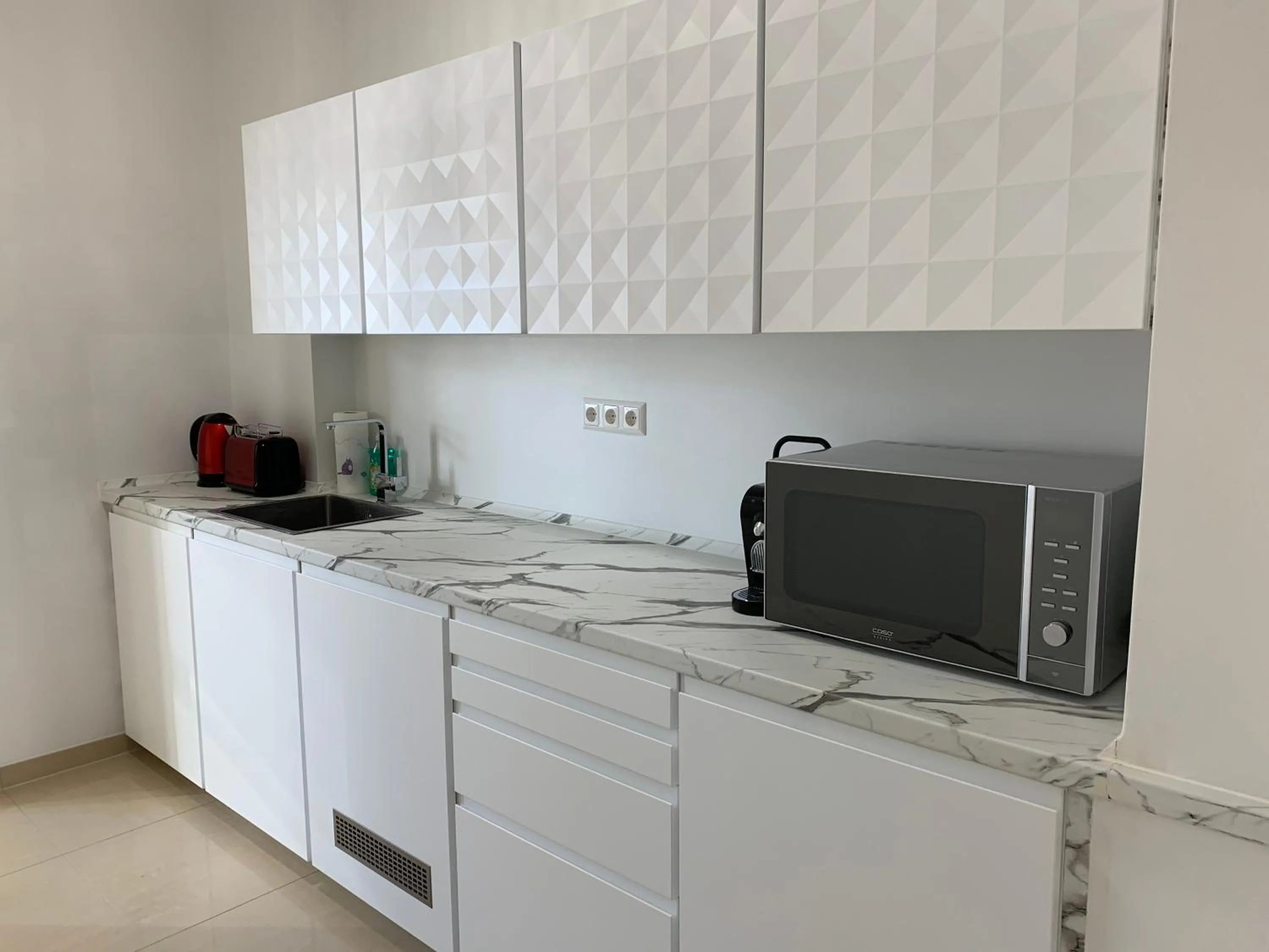 Kitchen or kitchenette in Colony Apartments
