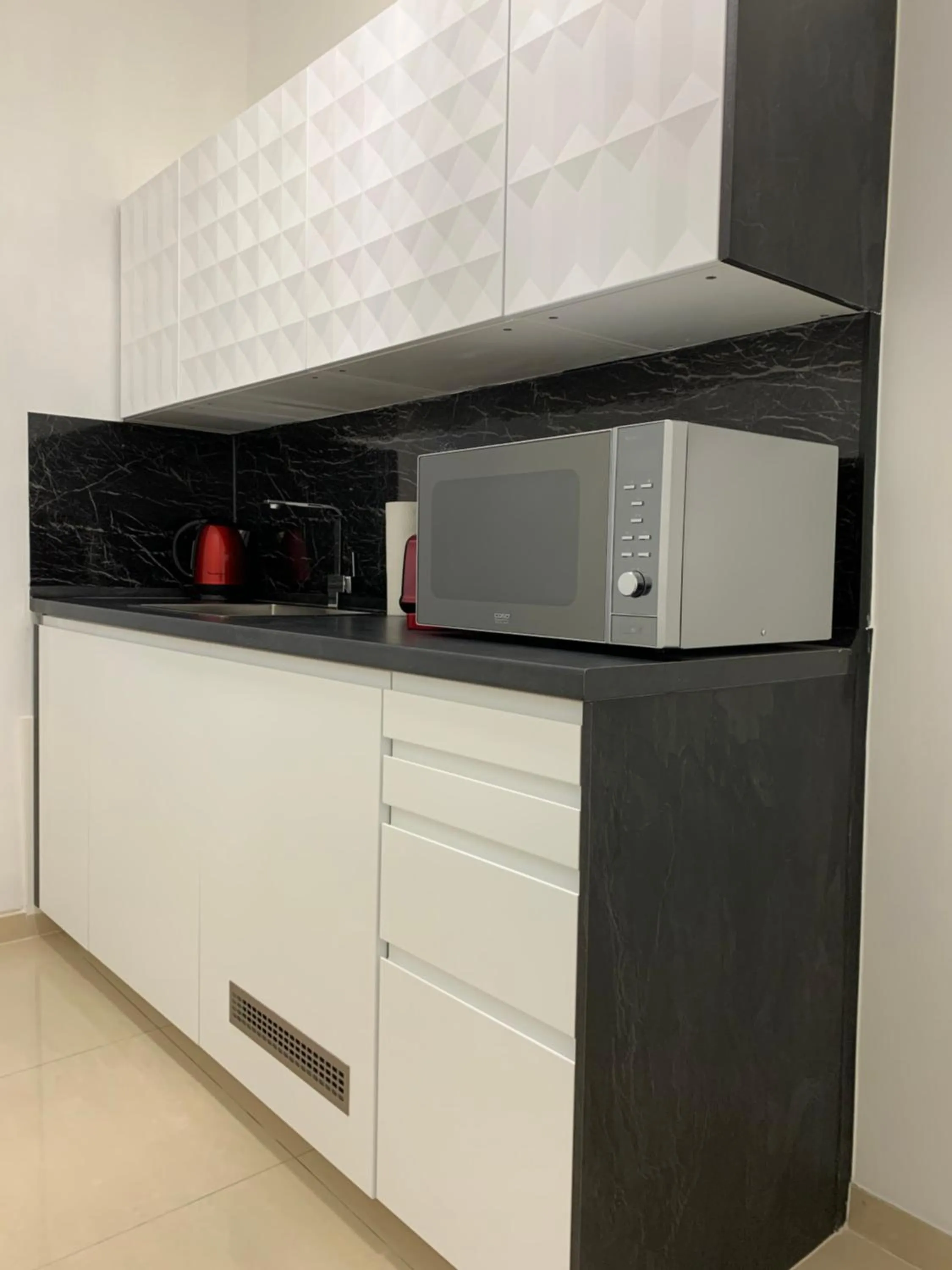 Kitchen or kitchenette in Colony Apartments