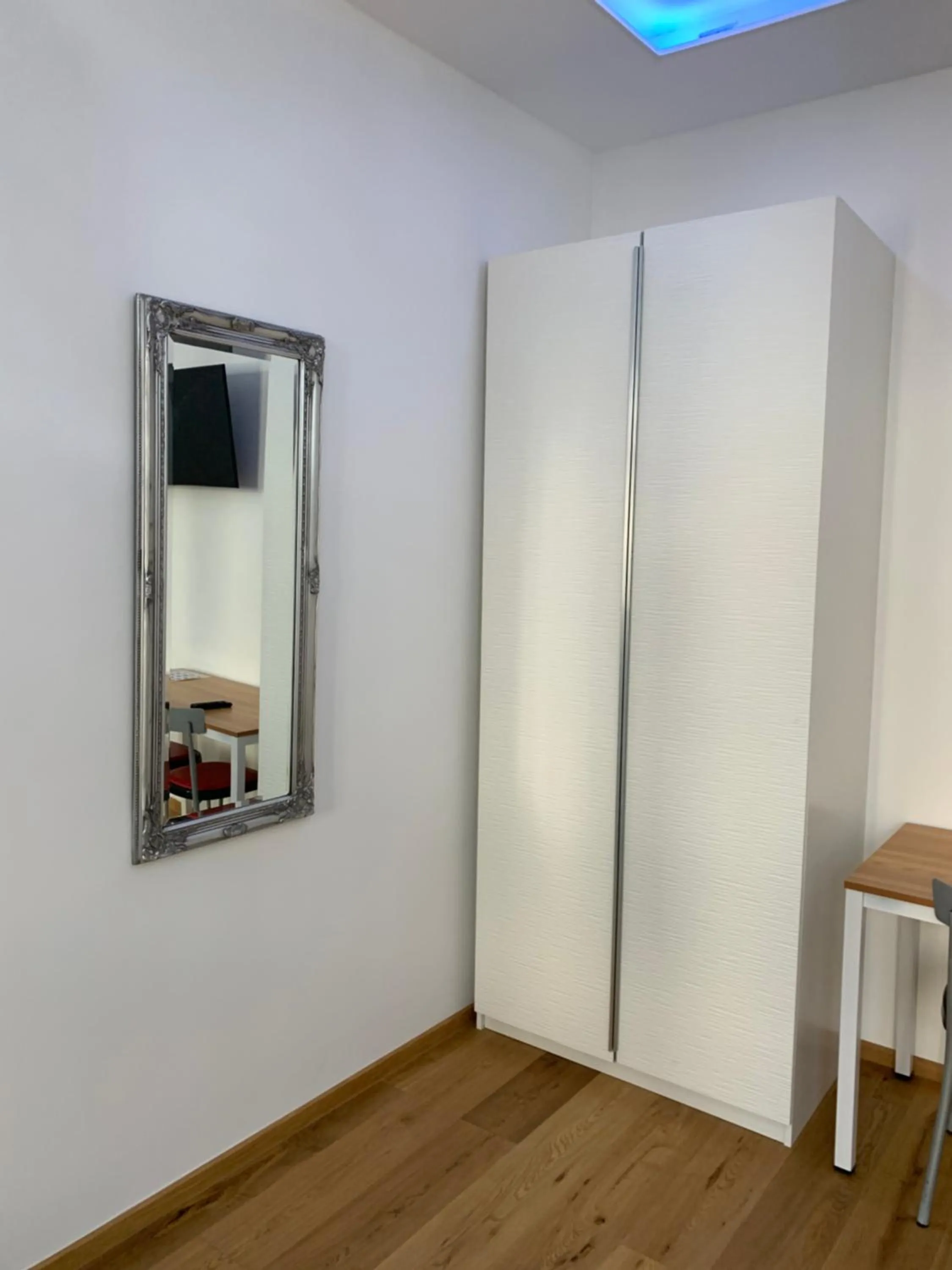 Communal lounge/ TV room in Colony Apartments