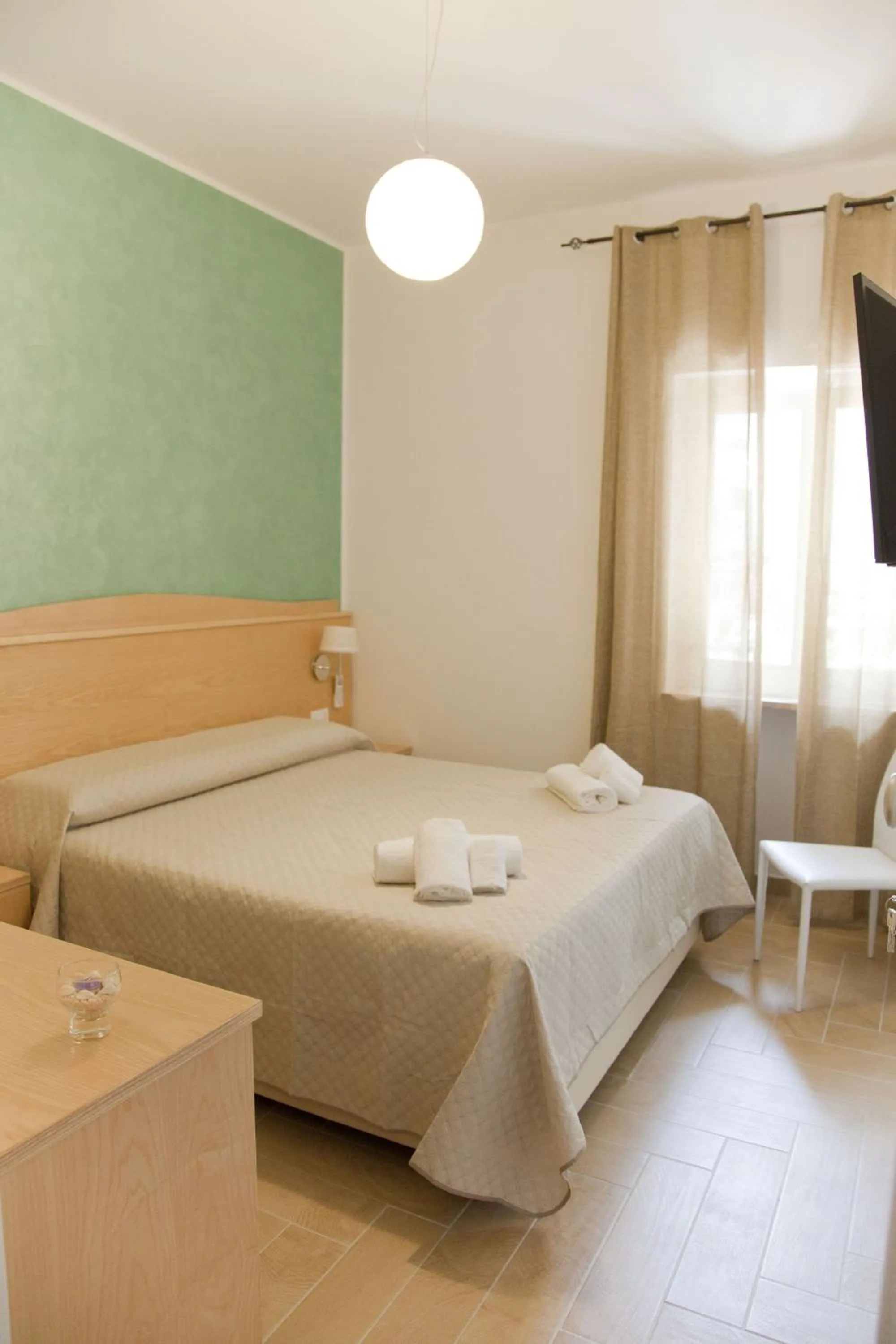 Bed in Donna Rosa Accommodation