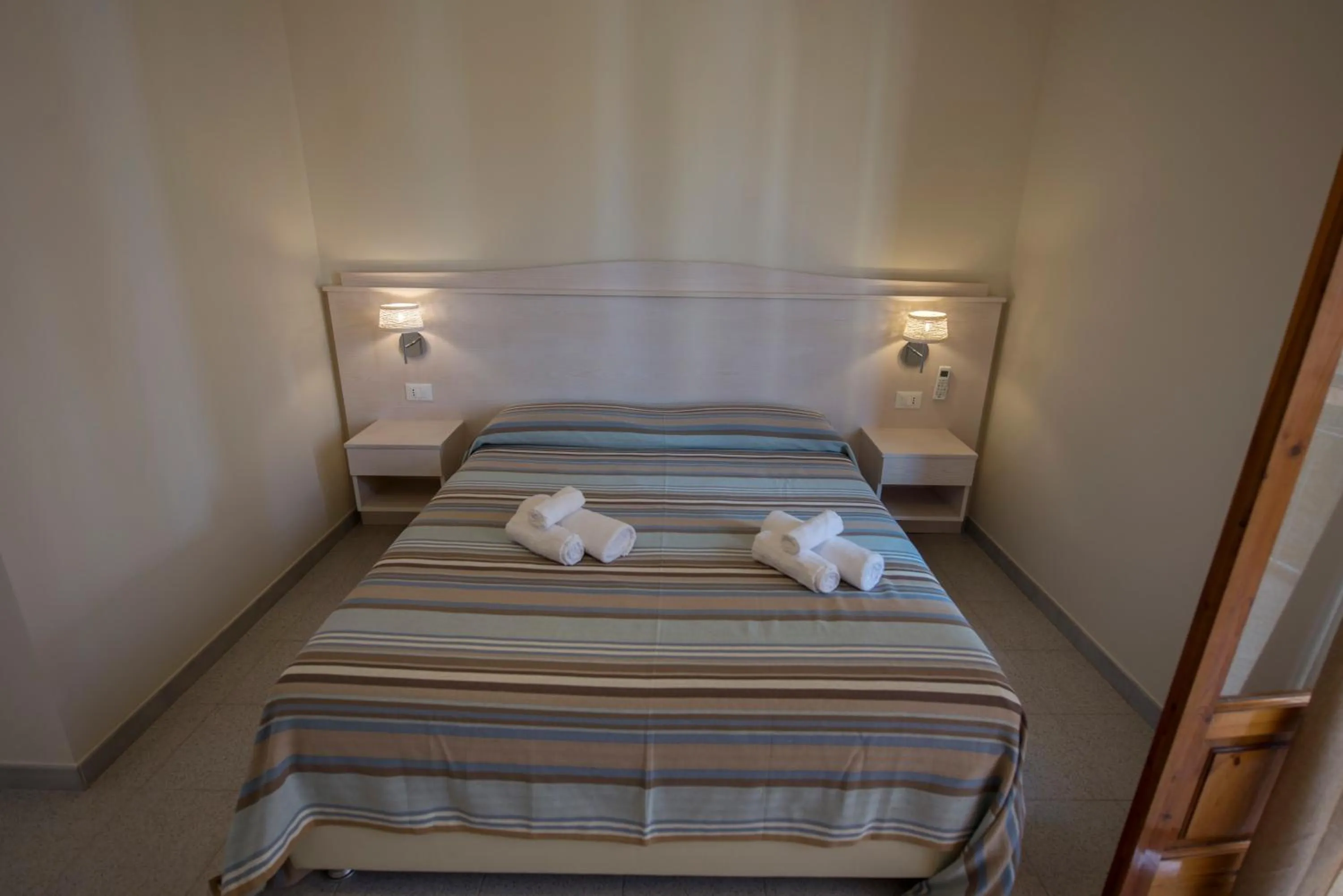 Bed in Donna Rosa Accommodation