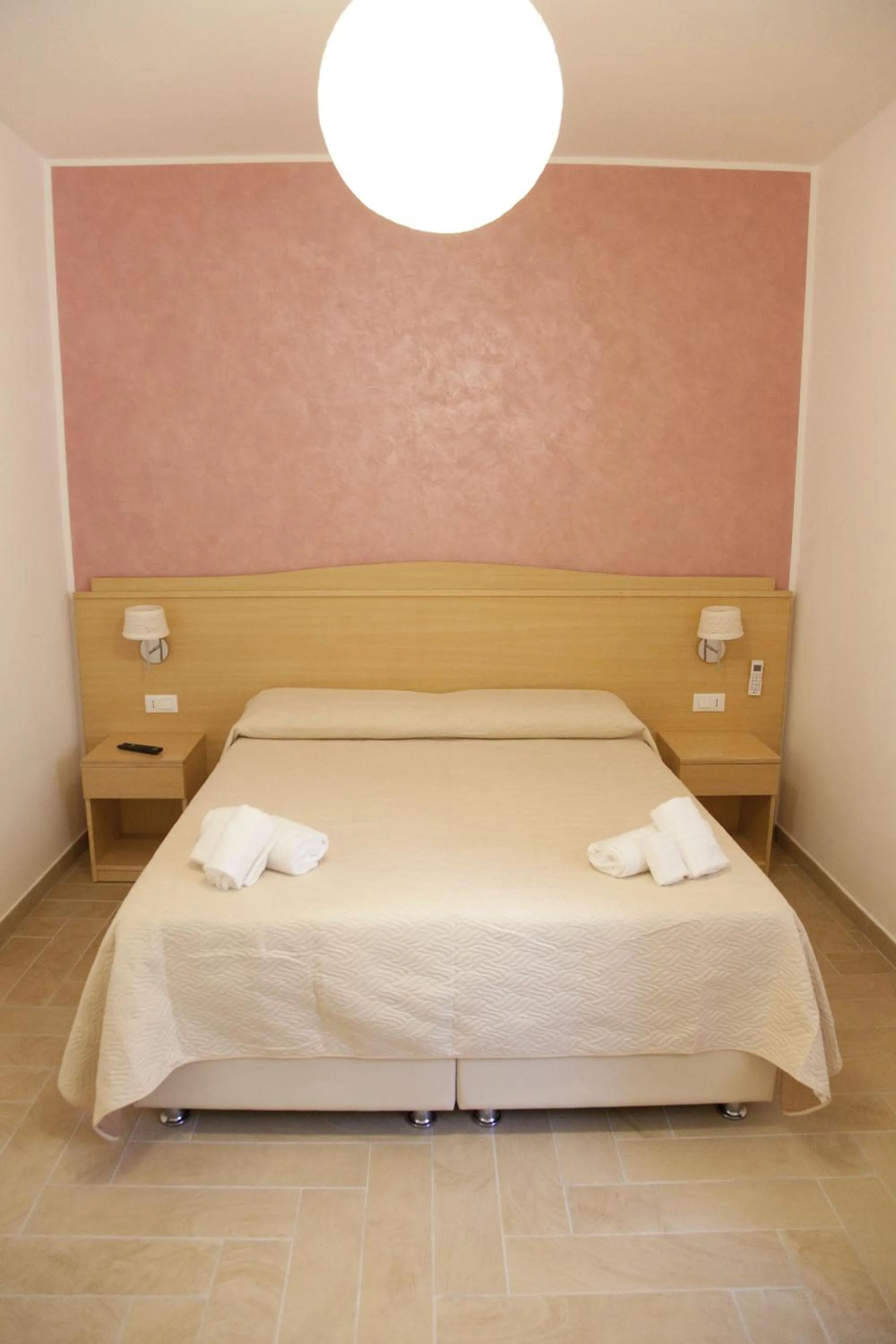 Bed in Donna Rosa Accommodation