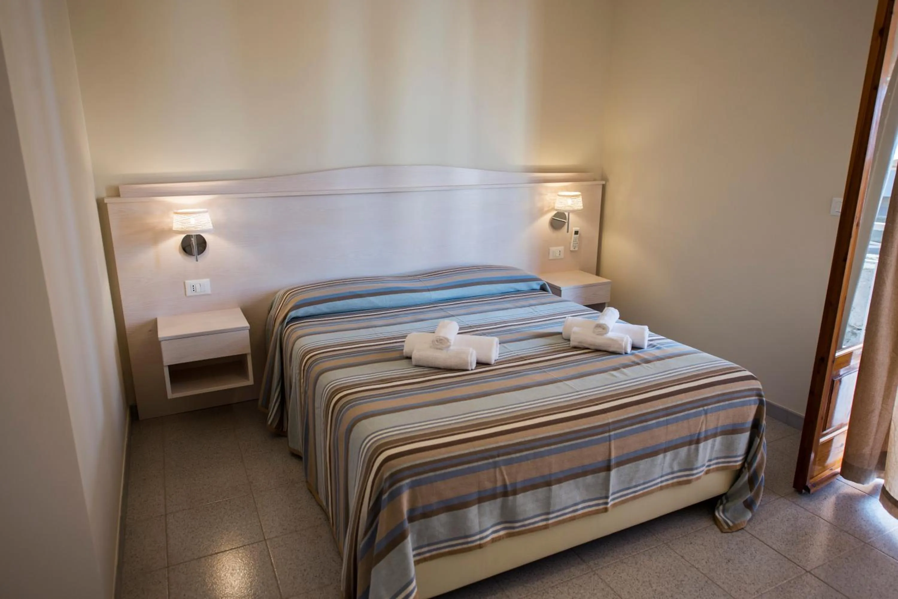 Bed in Donna Rosa Accommodation