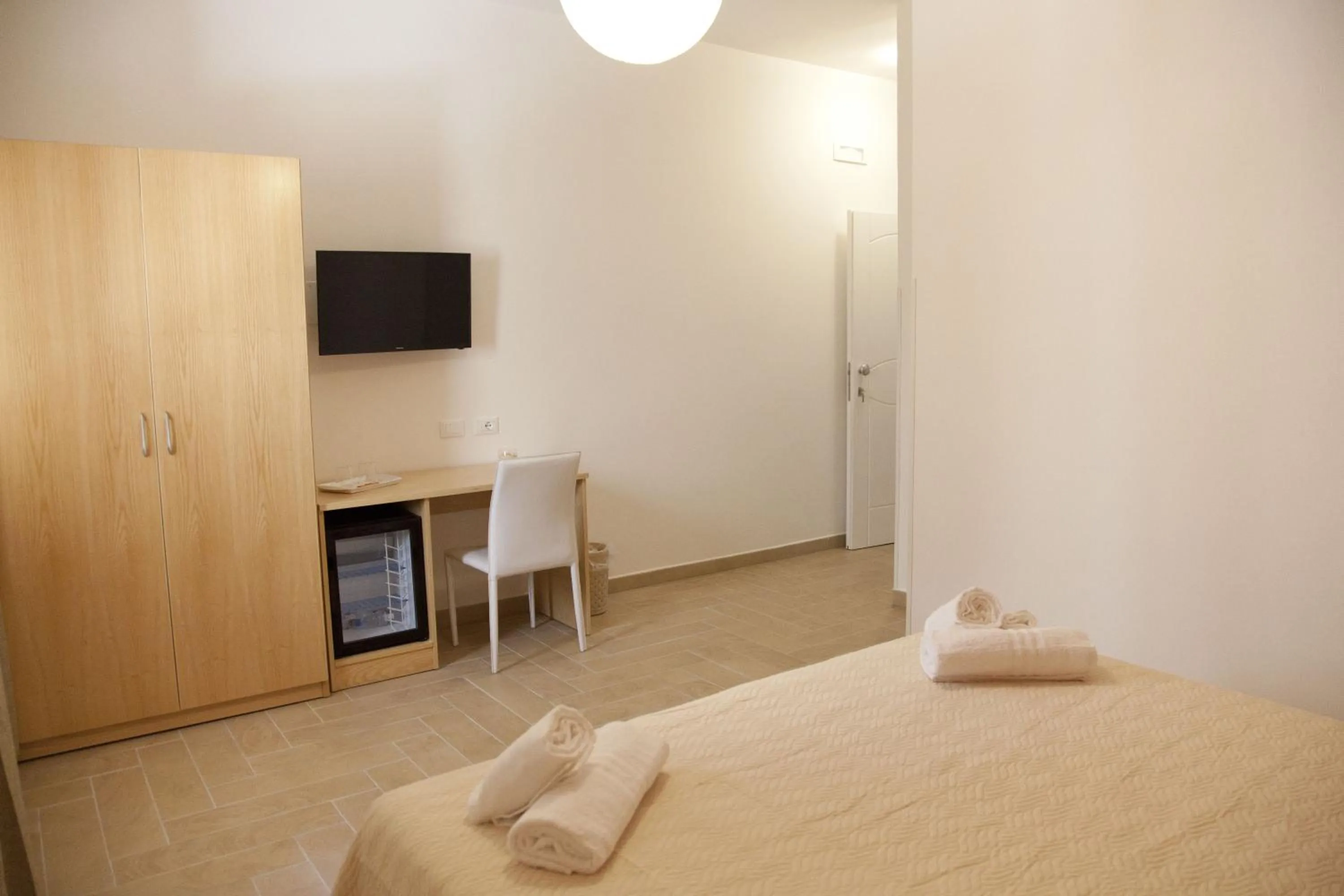 Bed in Donna Rosa Accommodation