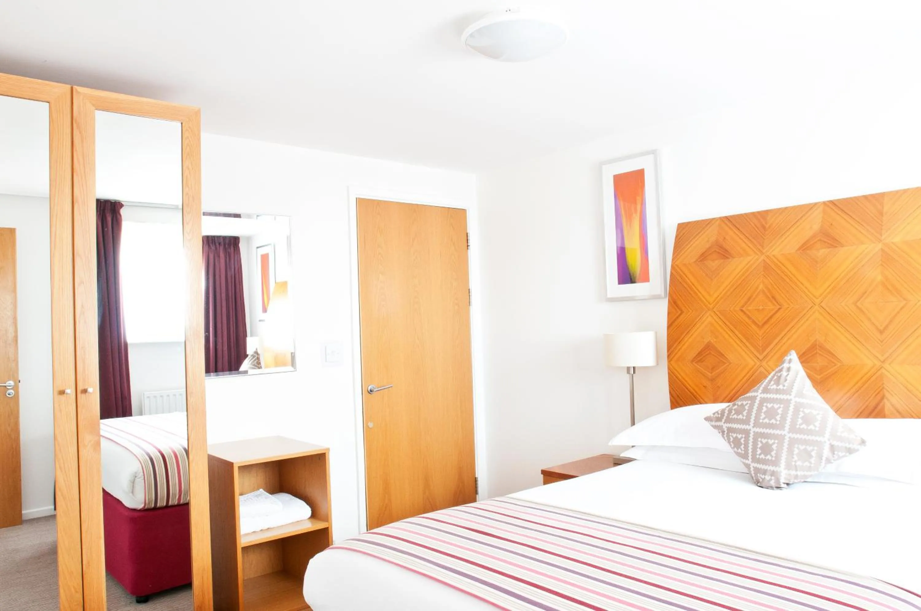 Bedroom, Bed in PREMIER SUITES Newcastle