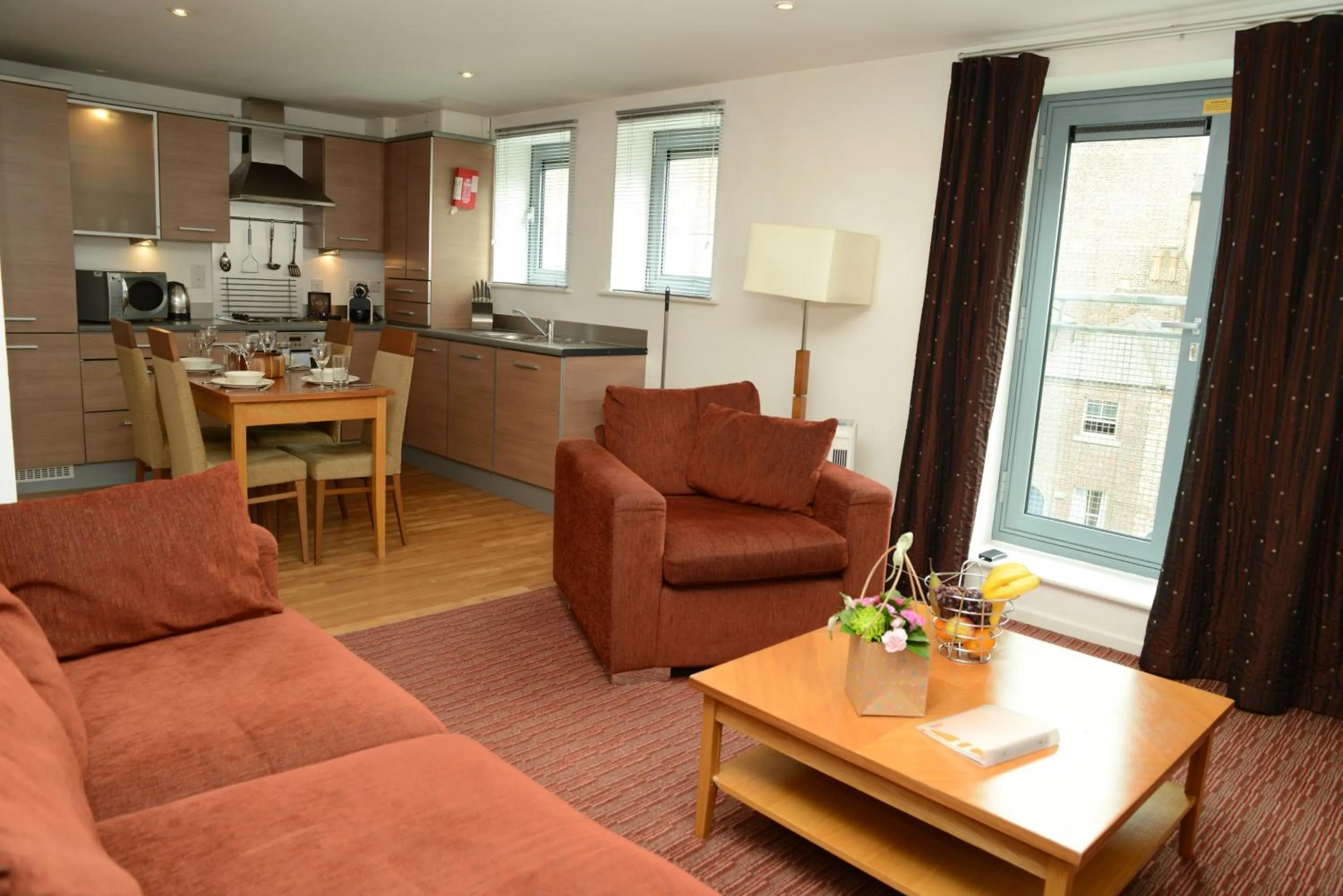 Kitchen or kitchenette in PREMIER SUITES Newcastle