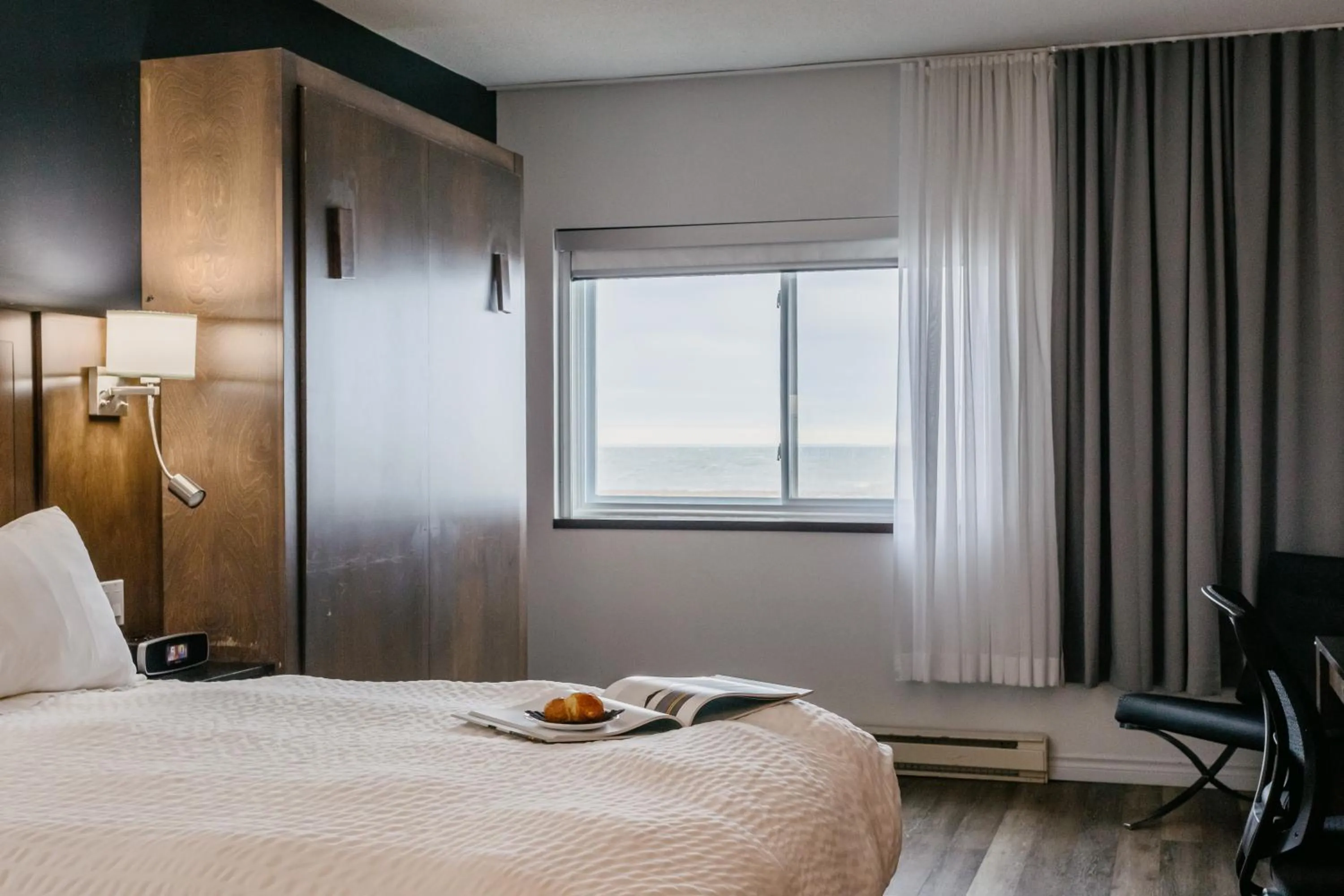 Photo of the whole room, Bed in Riotel Matane