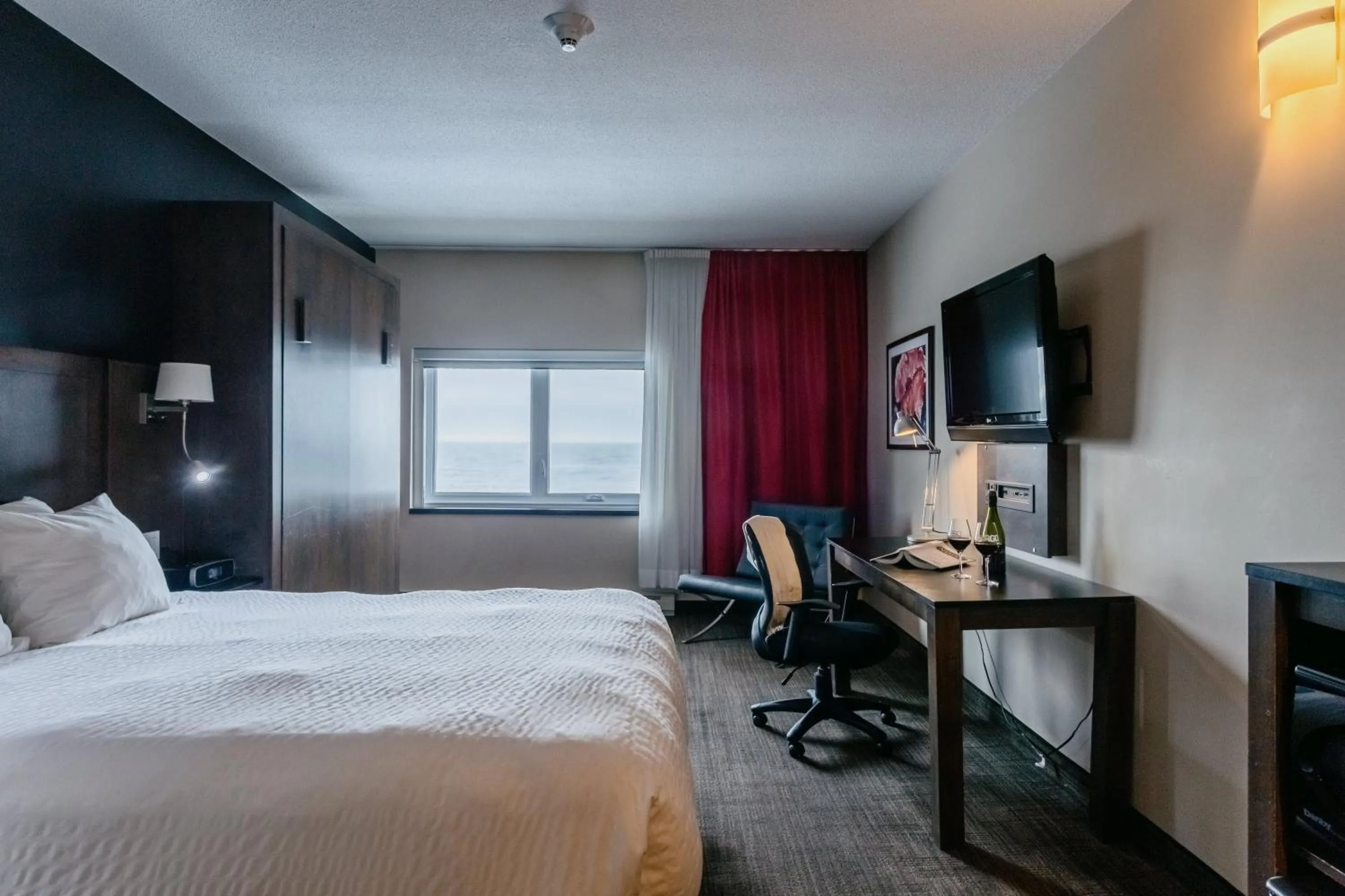 Photo of the whole room, Bed in Riotel Matane