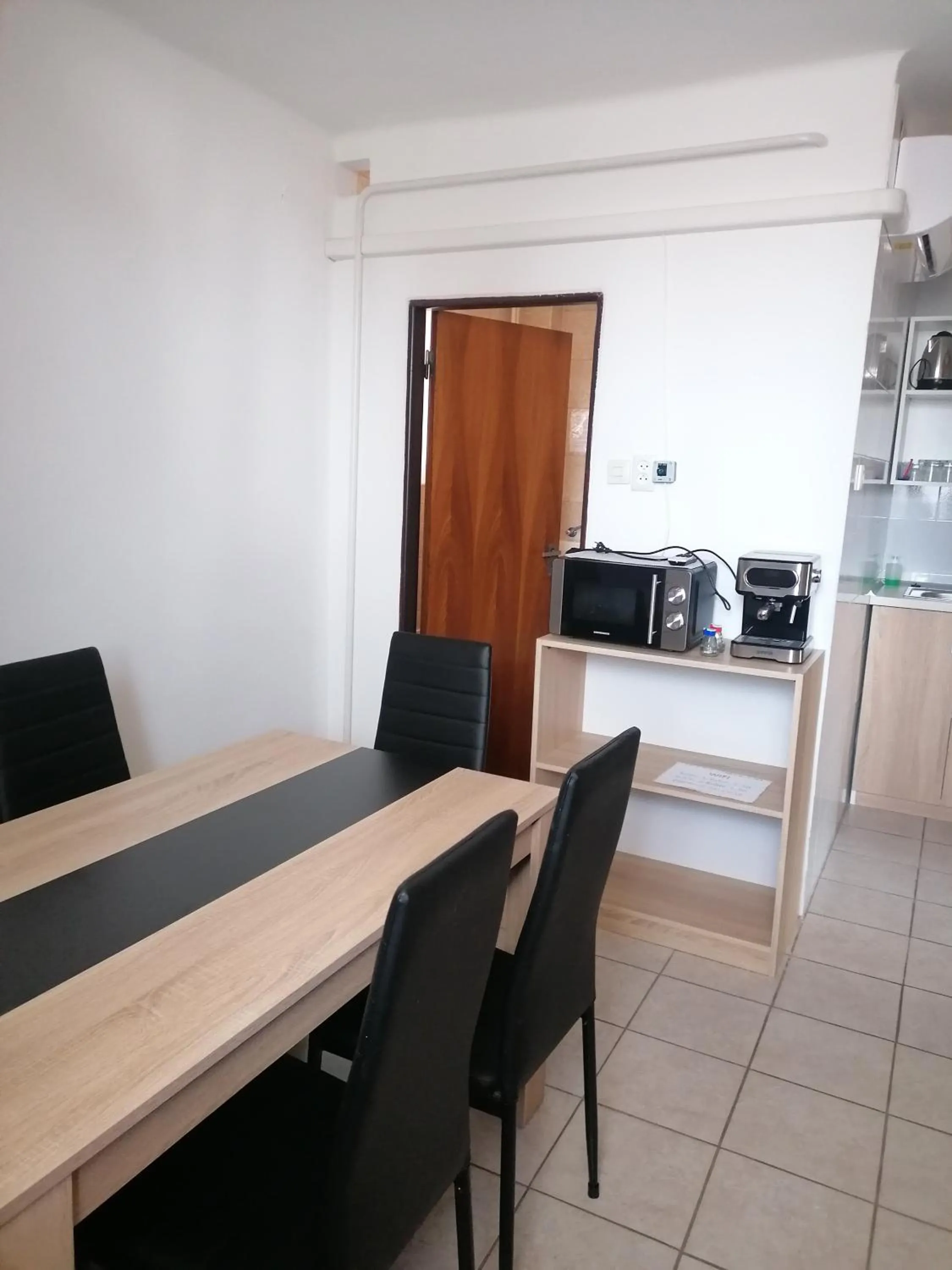 Dining area in Rubin Apartman