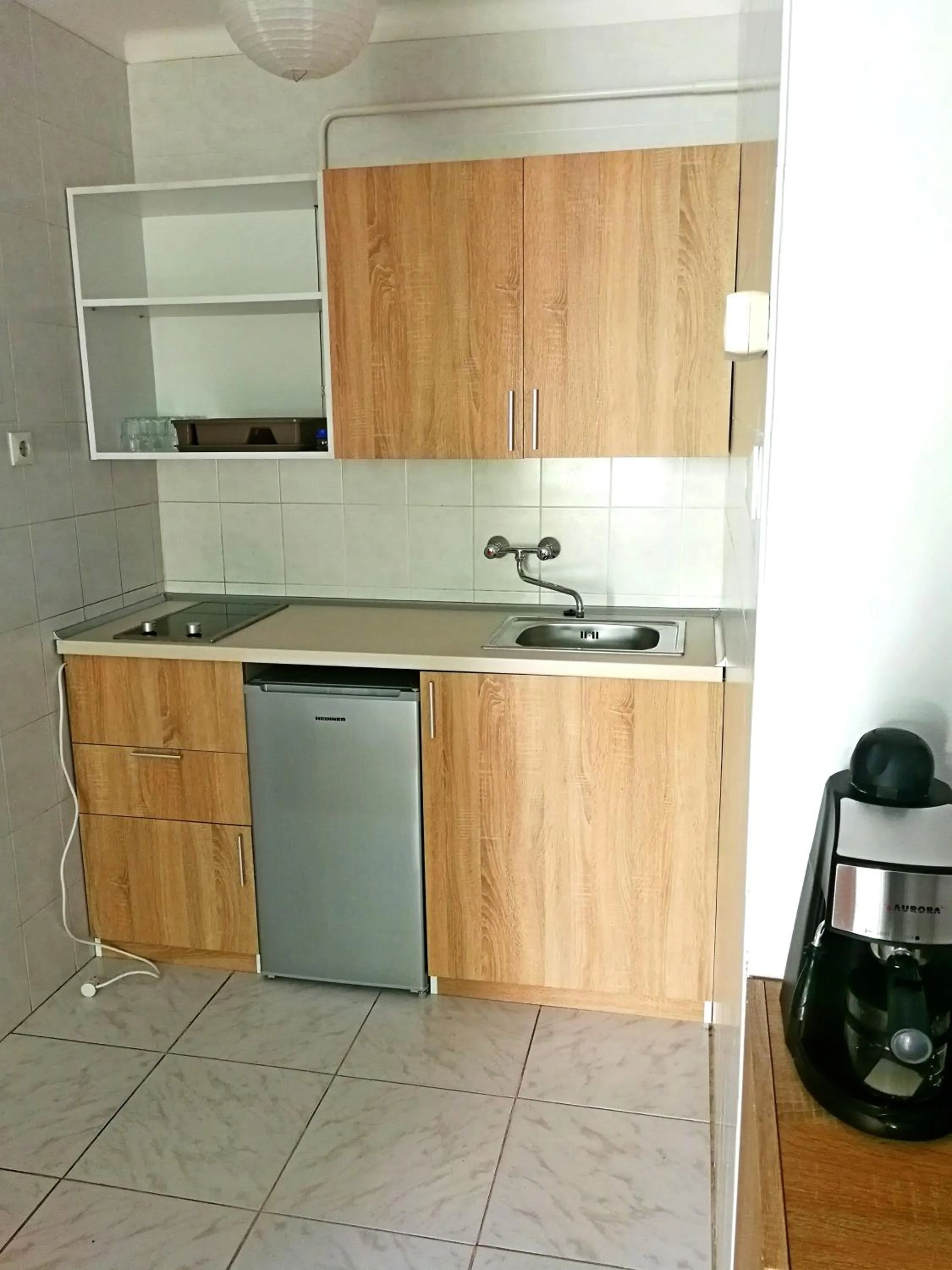 Kitchen or kitchenette in Rubin Apartman