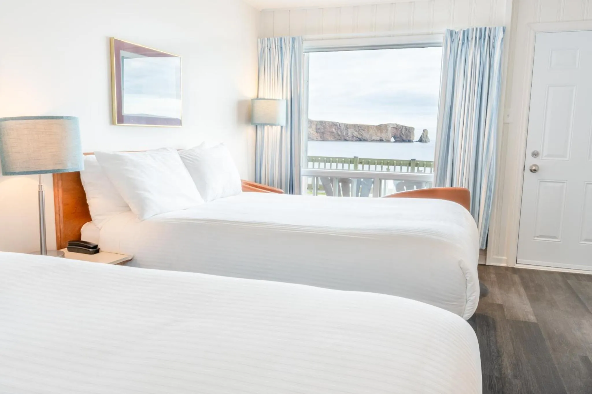 Photo of the whole room, Bed in Riotel Perce