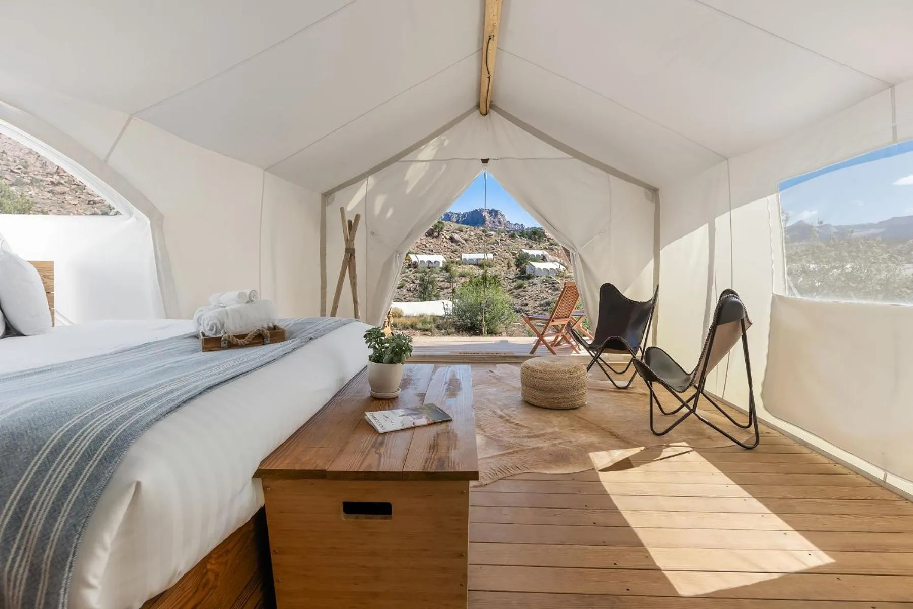 Seating area, Bed in Under Canvas Zion