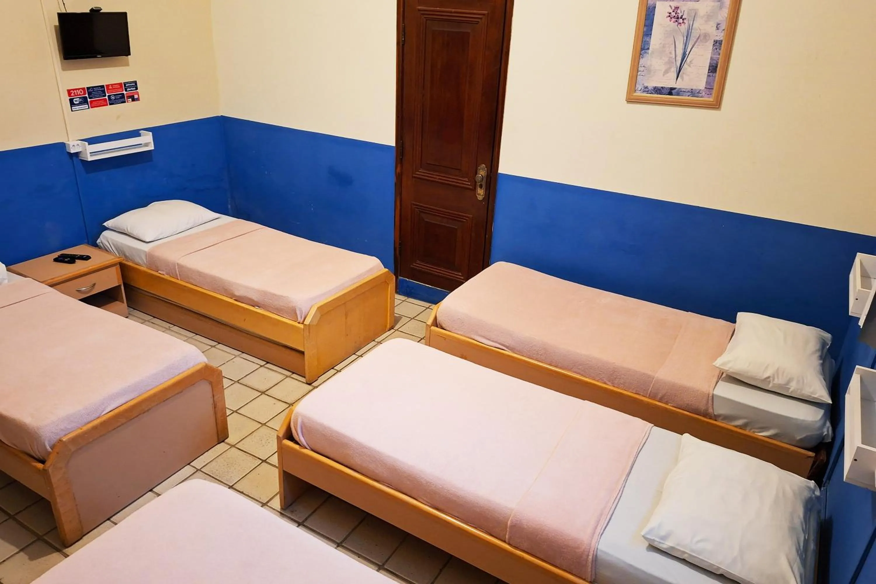 Bed in Pousada Casa Grande