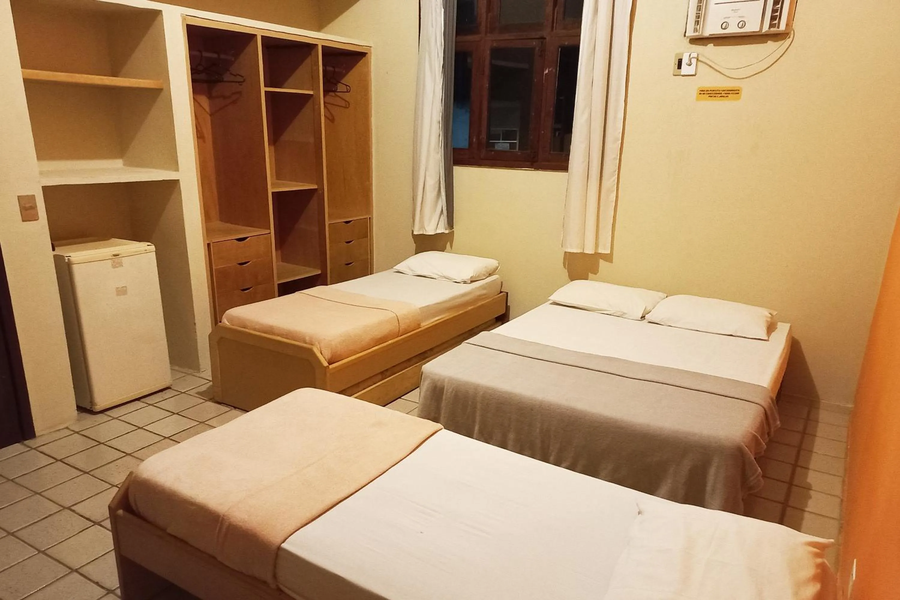 Bed in Pousada Casa Grande