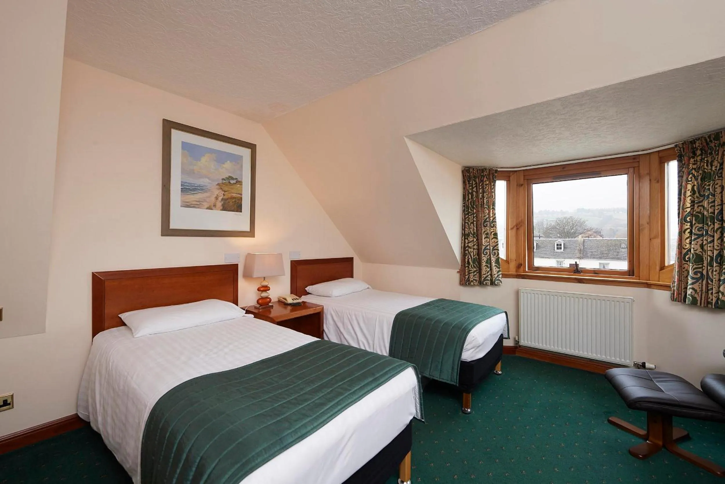 Bed in The Priory Hotel