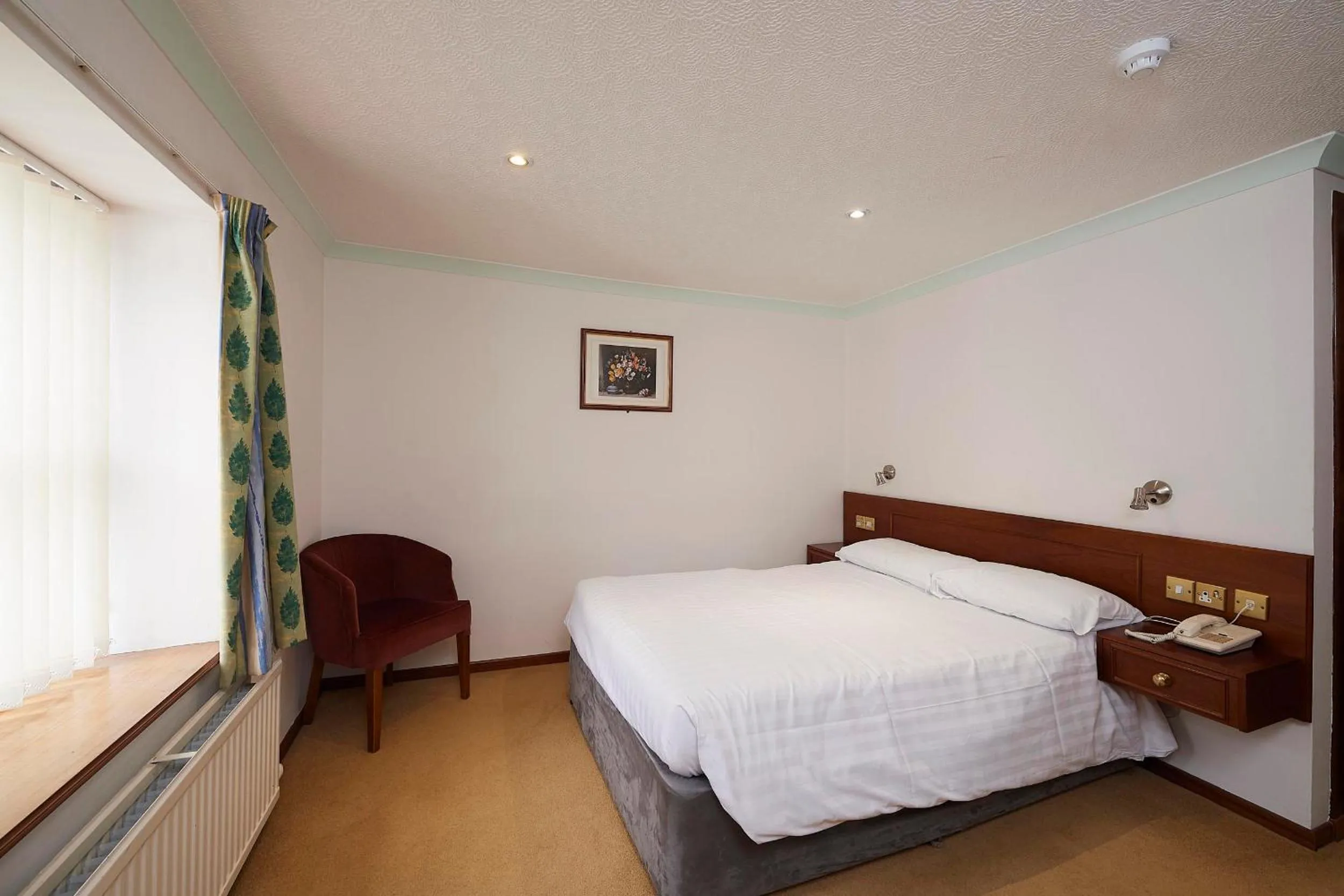 Bed in The Priory Hotel