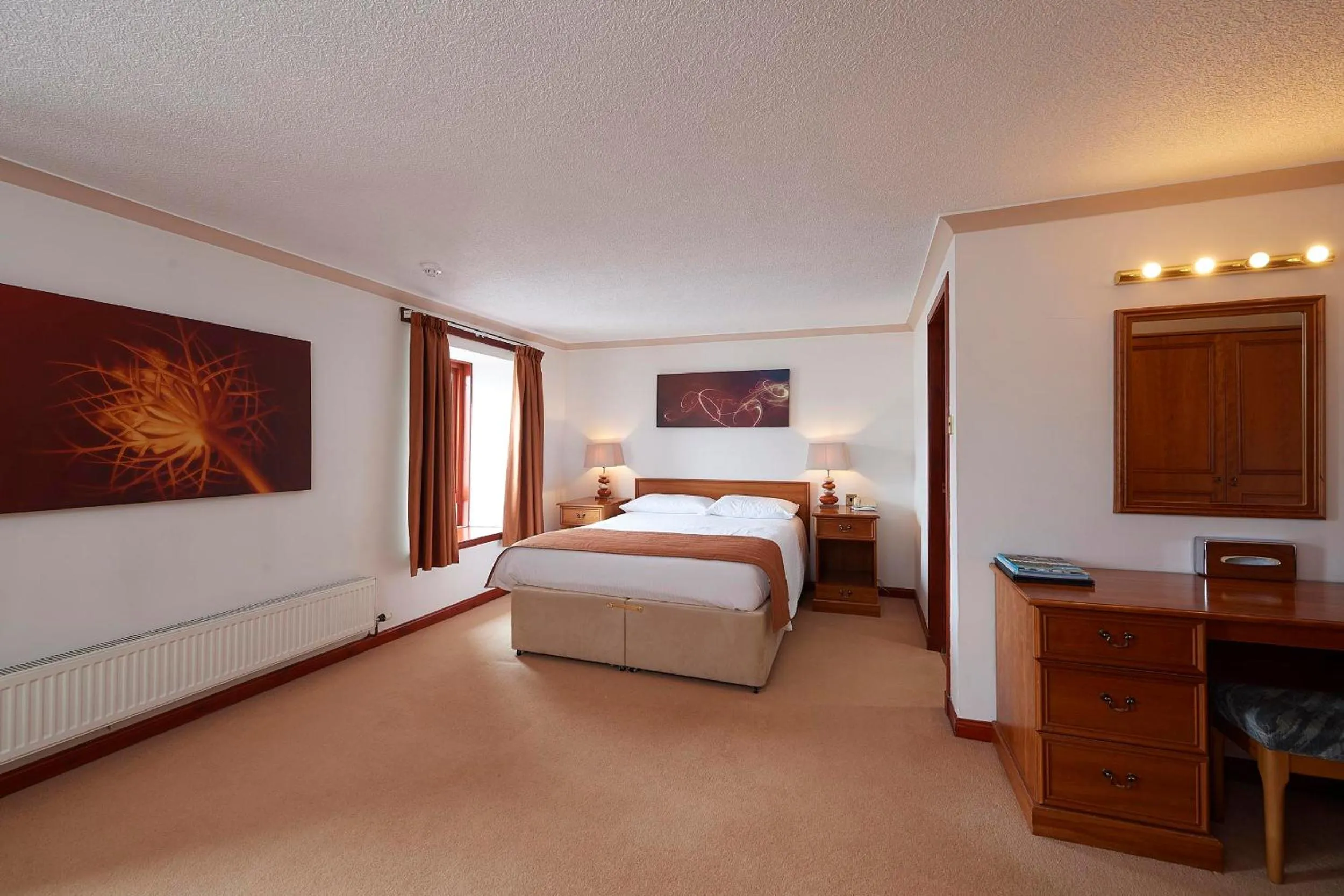 Bed in The Priory Hotel