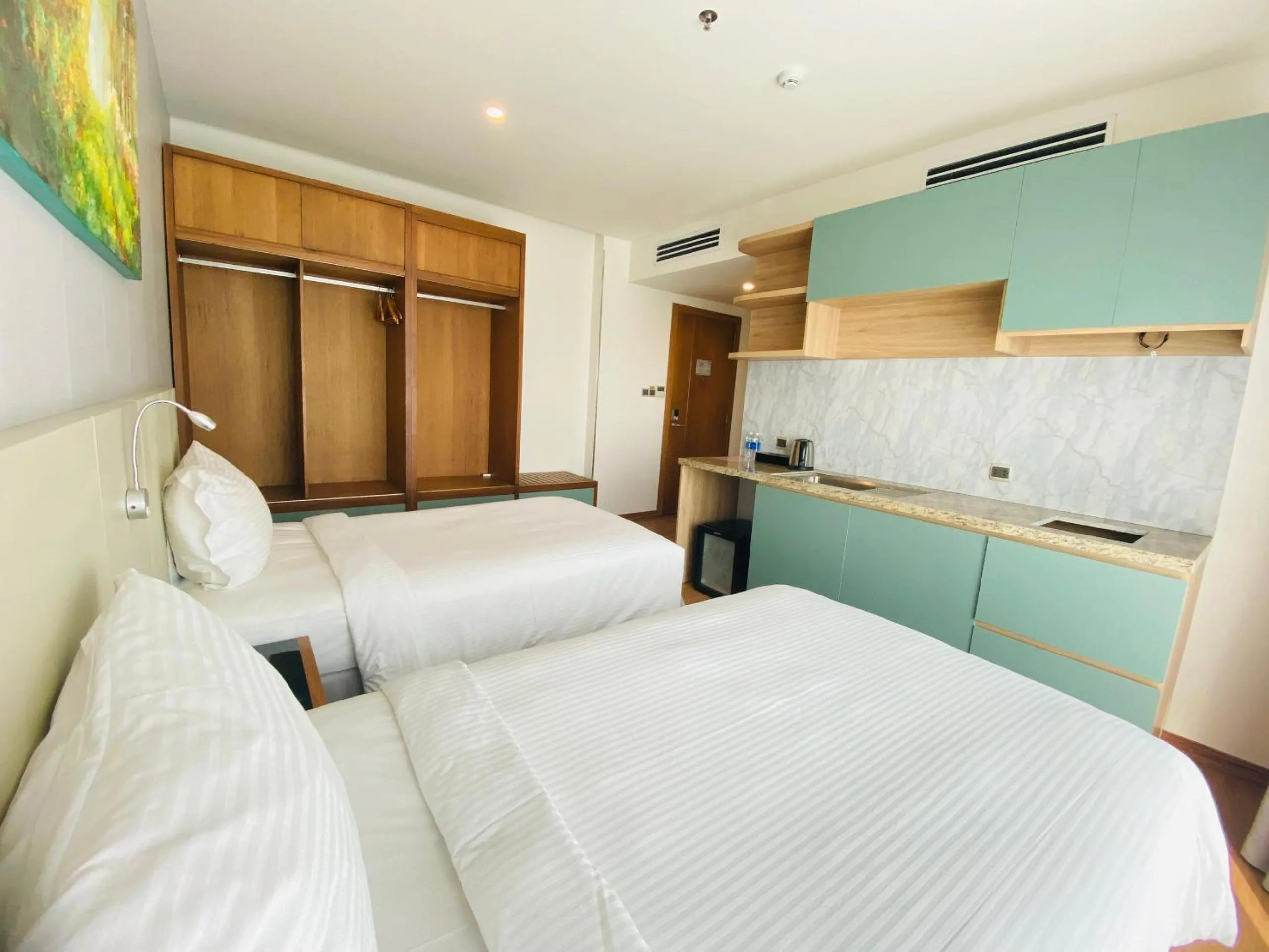 Bed in NAM Hotel & Residences