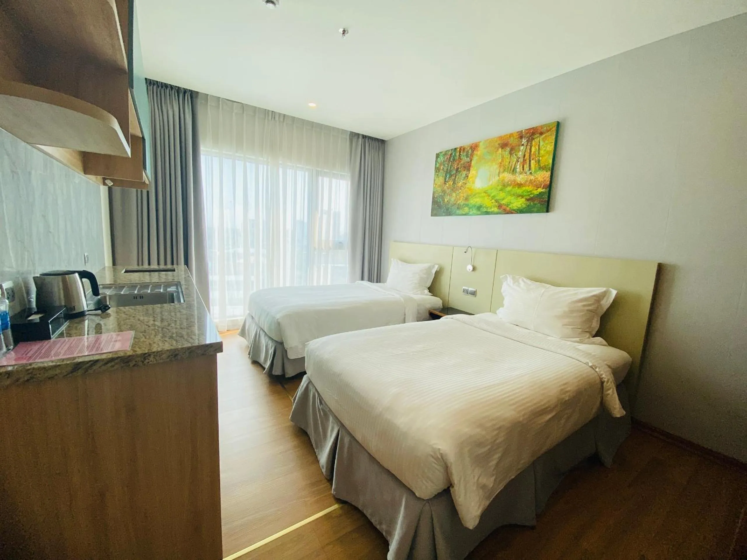 Bed in NAM Hotel & Residences