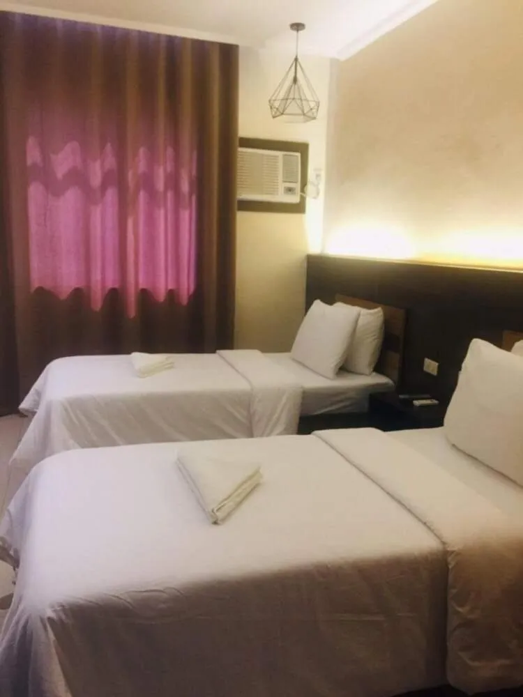 Bed in LEUX Hotel Alona Panglao