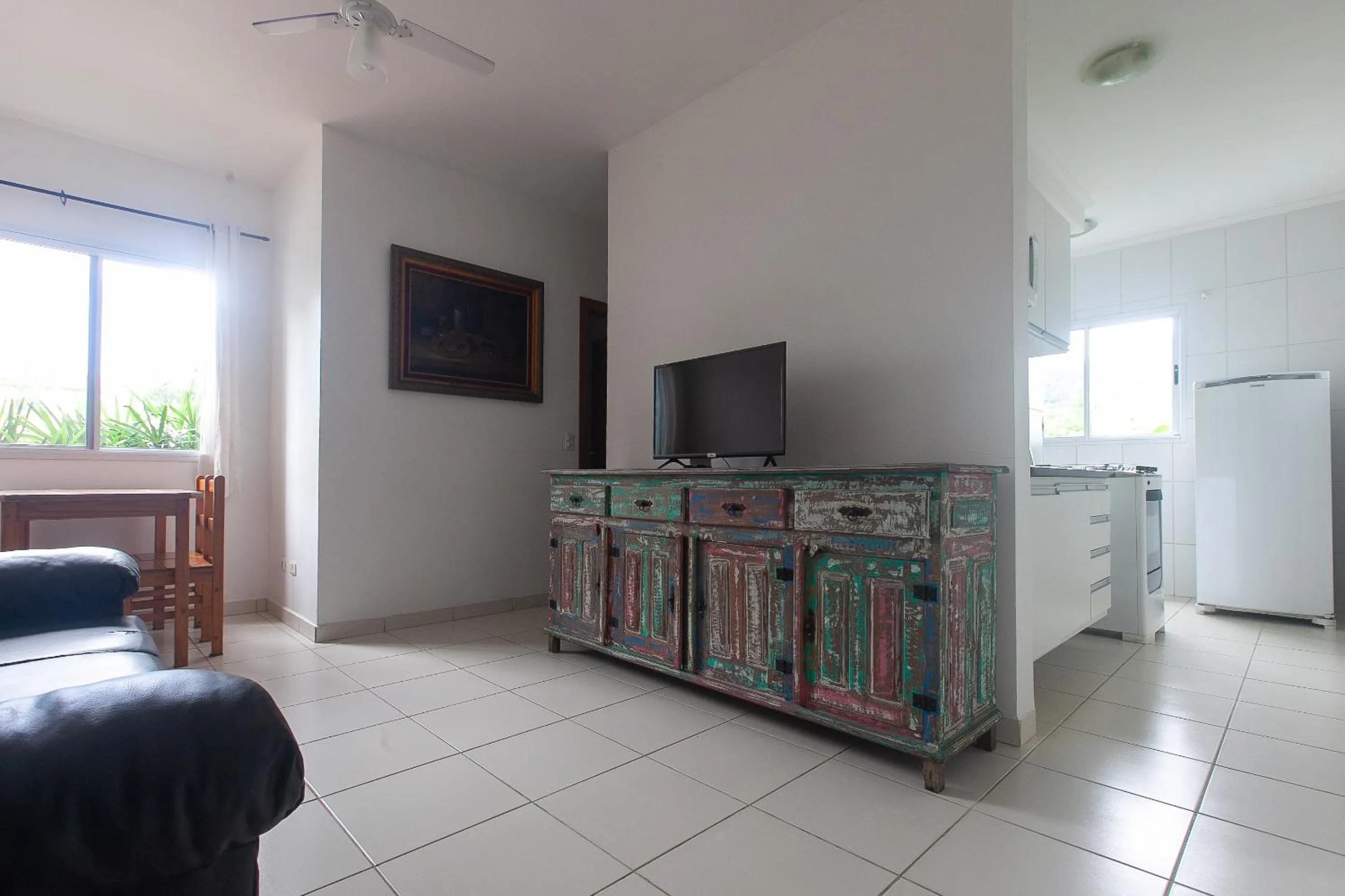 Communal lounge/ TV room in Apartamento Erica Itaguá proximo da Praia Grande