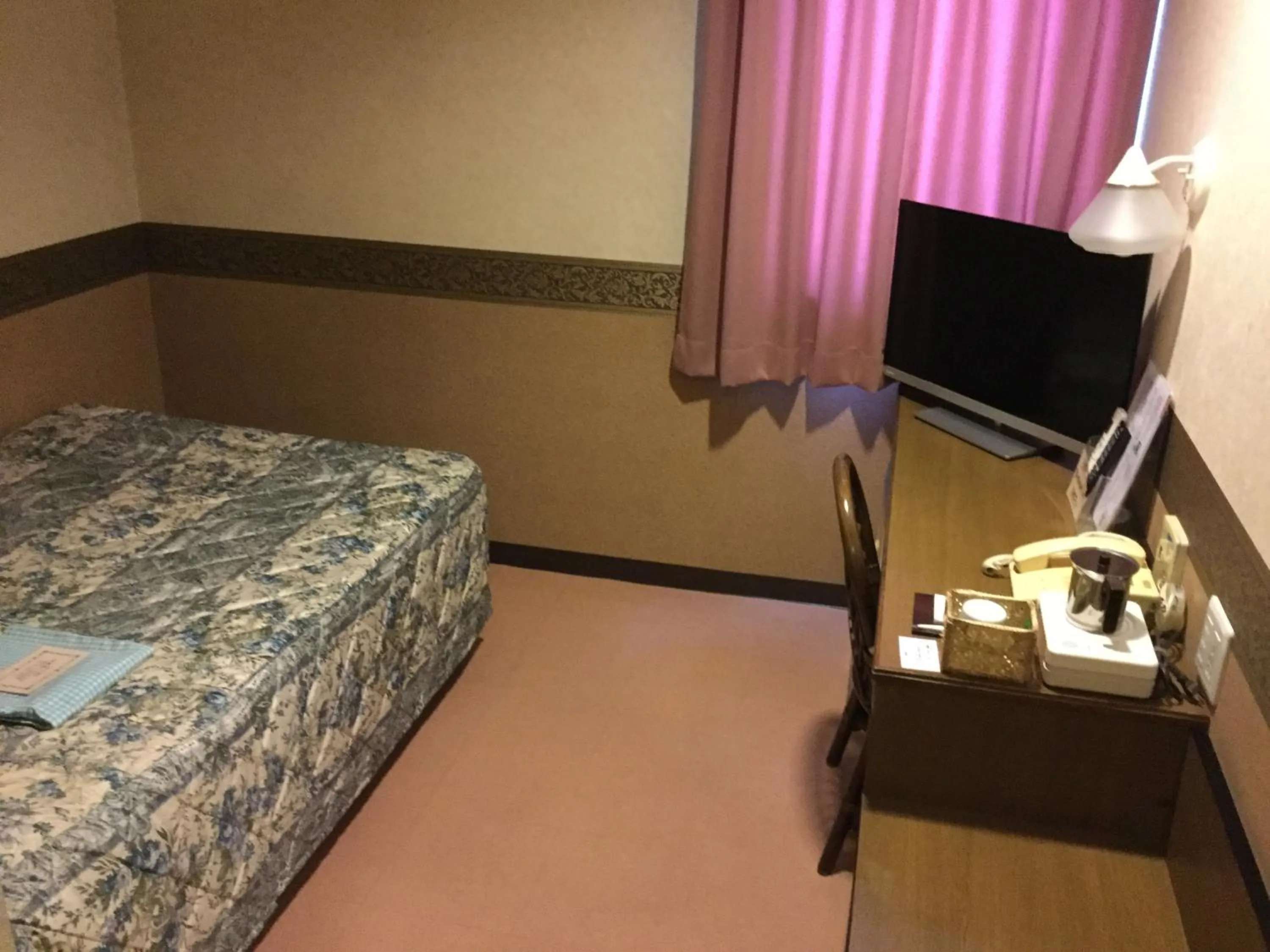 Bed in Maebashi Business Hotel Luka