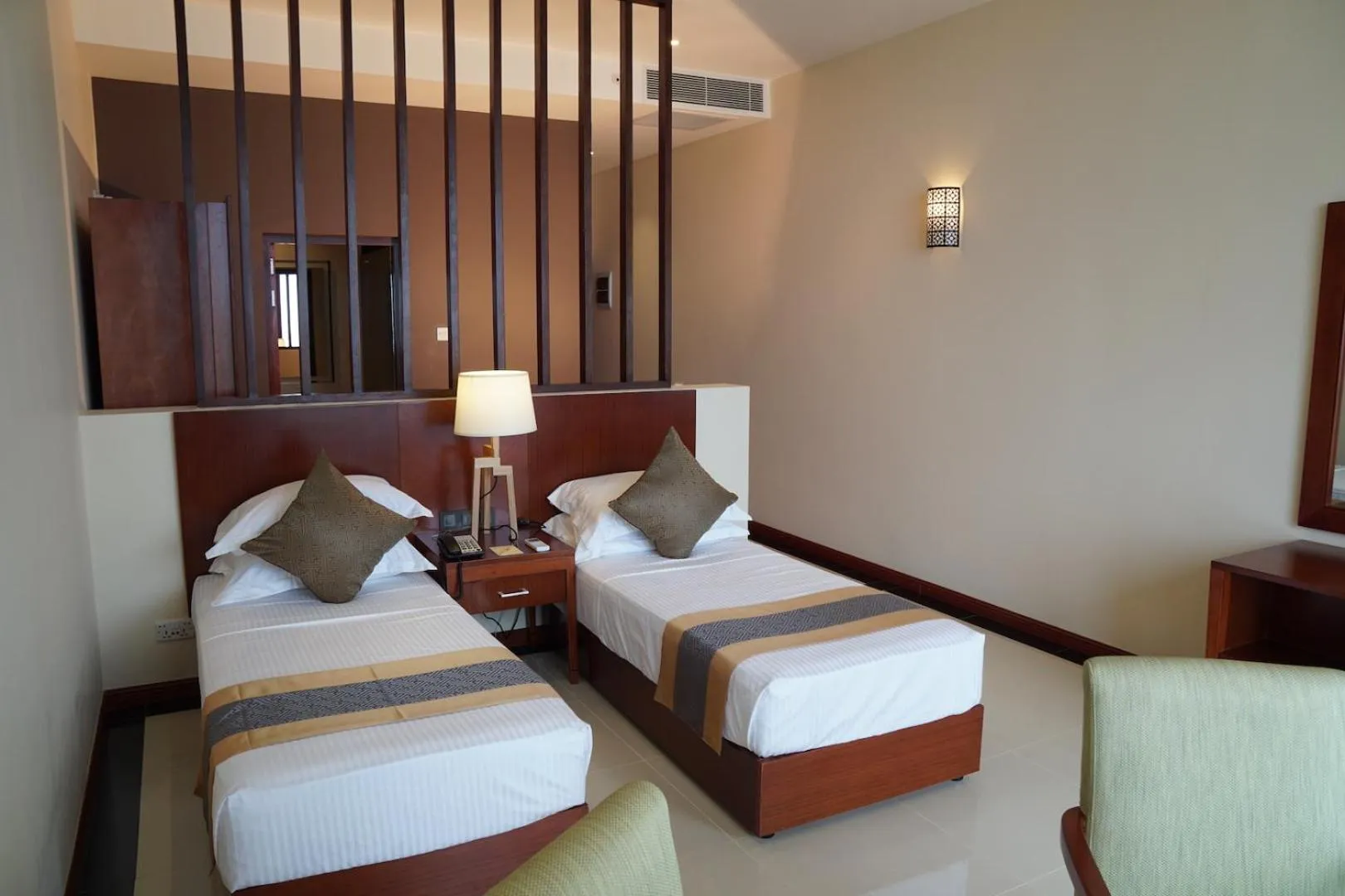 Bed in Sooriya Resort & Spa