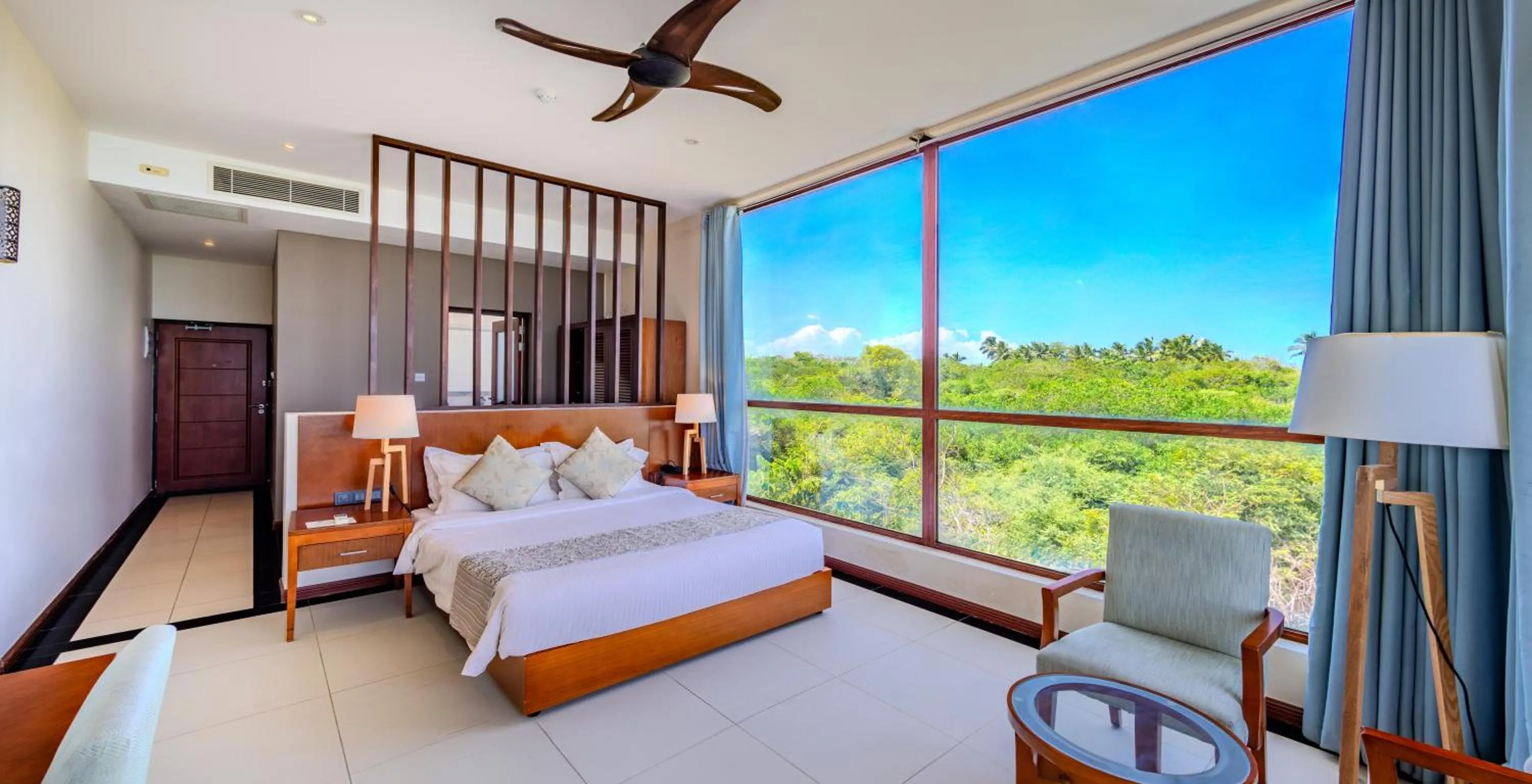 Bed in Sooriya Resort & Spa